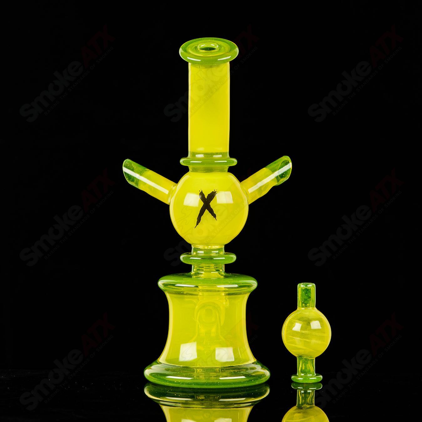 Colorful Xhalerator RAM Robert Mickelsen glass concentrate rig with intricate design and vibrant hues, handcrafted by RAM.