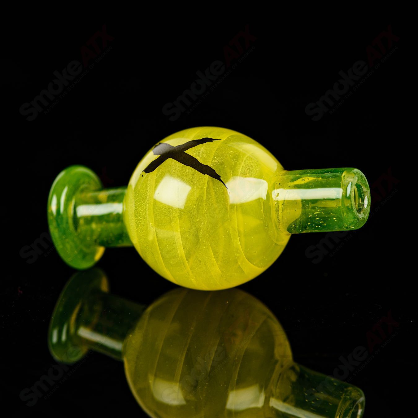 Colorful Xhalerator RAM Robert Mickelsen glass concentrate rig with intricate design and vibrant hues, handcrafted heady glass art.