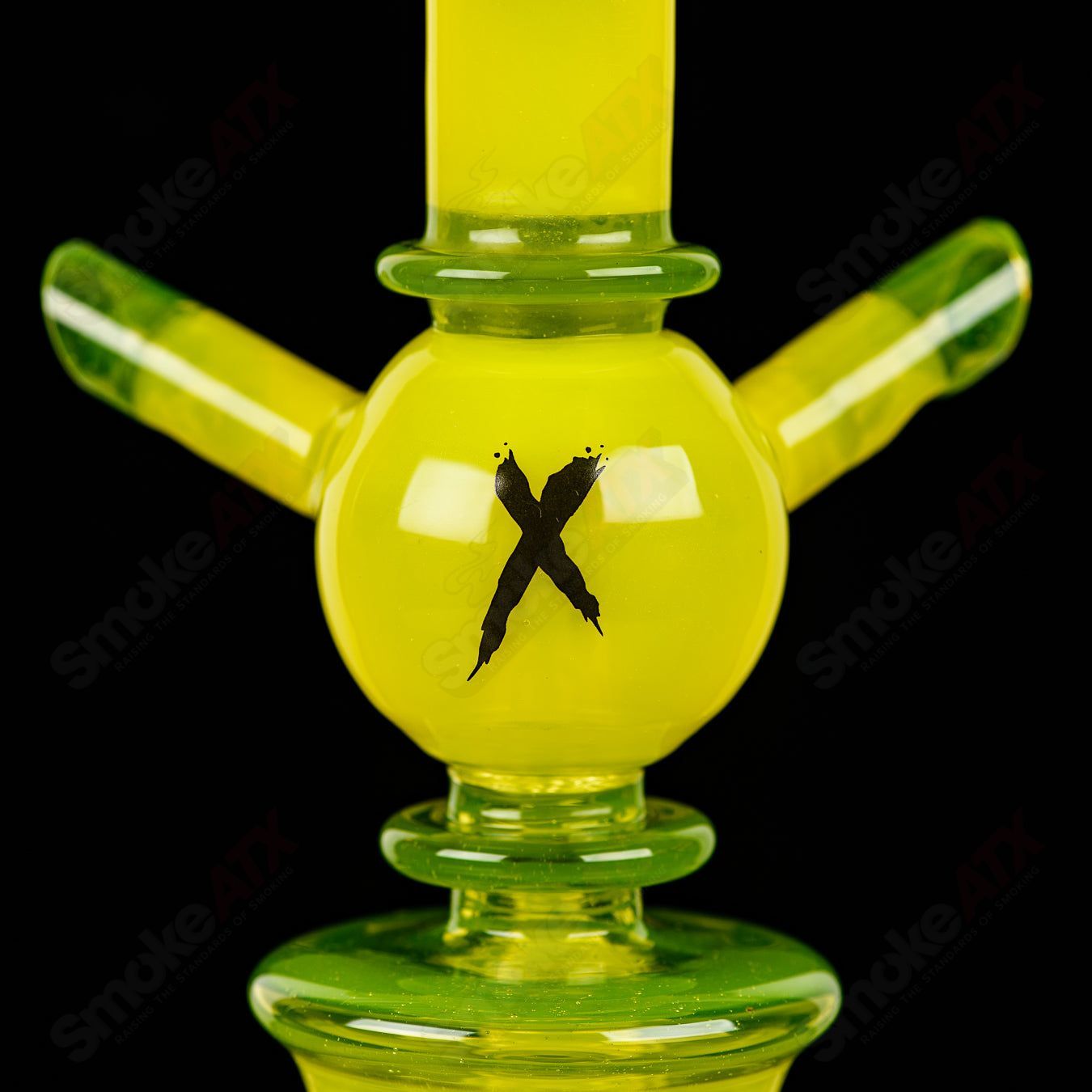 Colored Xhalerator RAM Robert Mickelsen glass concentrate rig with intricate design and vibrant colors, fine craftsmanship in heady glass.