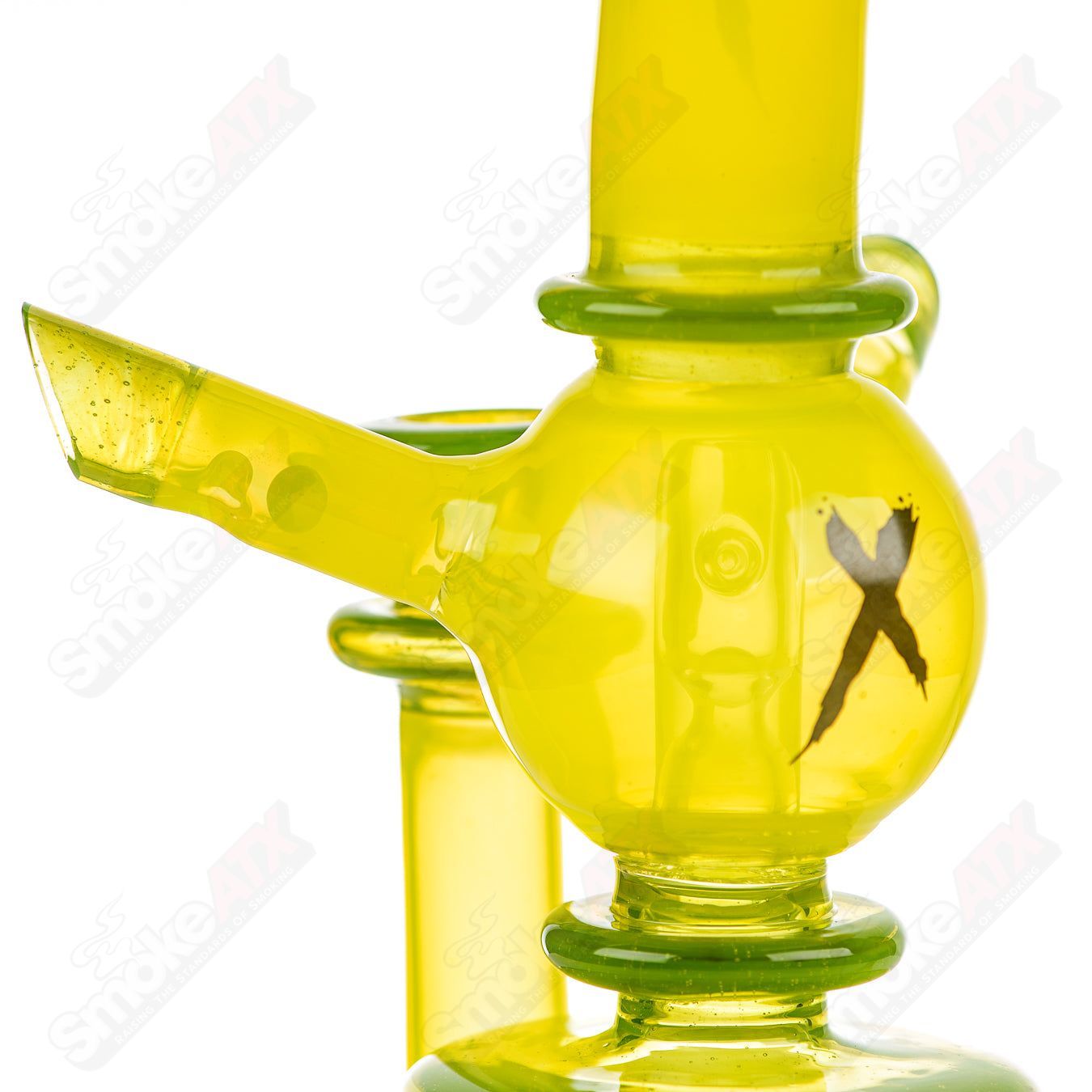 Colorful Xhalerator RAM Robert Mickelsen glass concentrate rig with intricate designs and vibrant hues, crafted for high-quality concentrates.