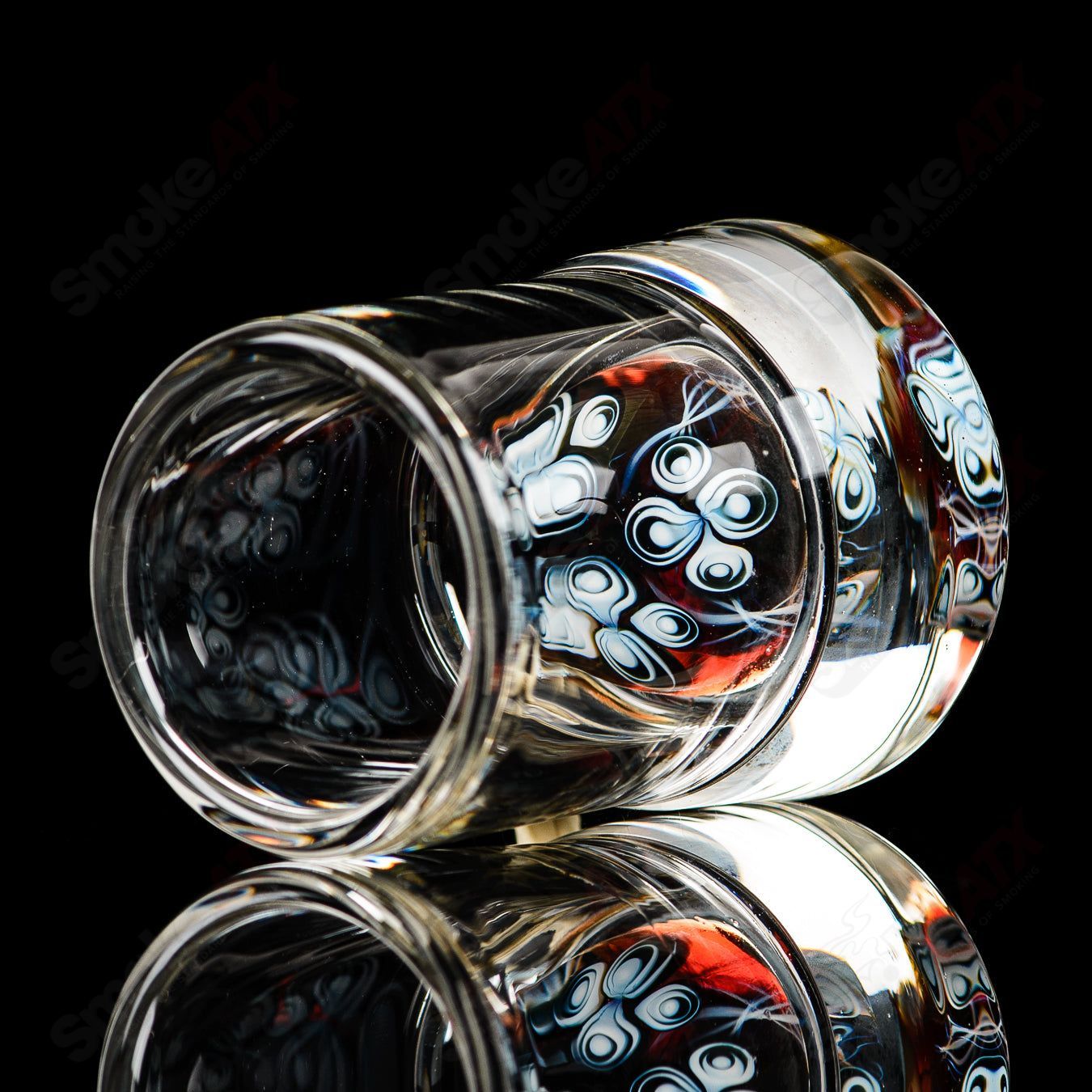 Indo Glass Dot Stack Shot Glass, a clear heady glass cup with a layered dot design, perfect for shot servings.