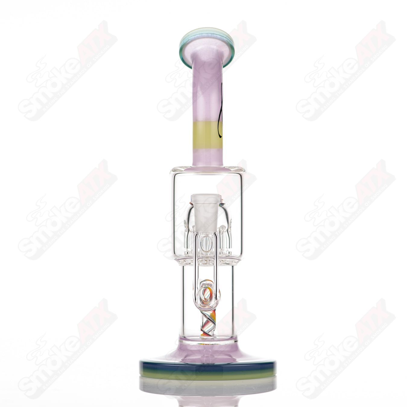 Toro Double Macro 8-Arm Tree glass concentrate rig with full color UV accents on foot and mouthpiece, featuring intricate design details.