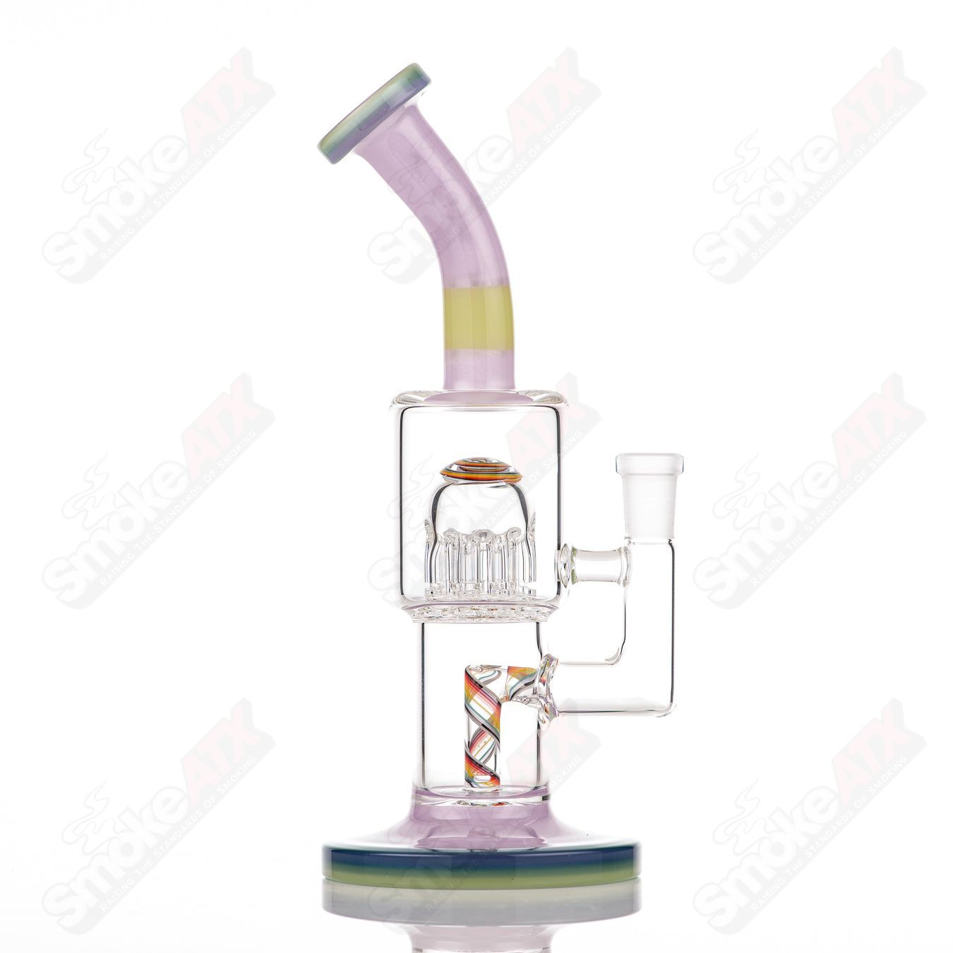 Toro Double Macro 8-Arm Tree Glass concentrate rig with full color UV accents on foot and mouthpiece, featuring intricate glass design.