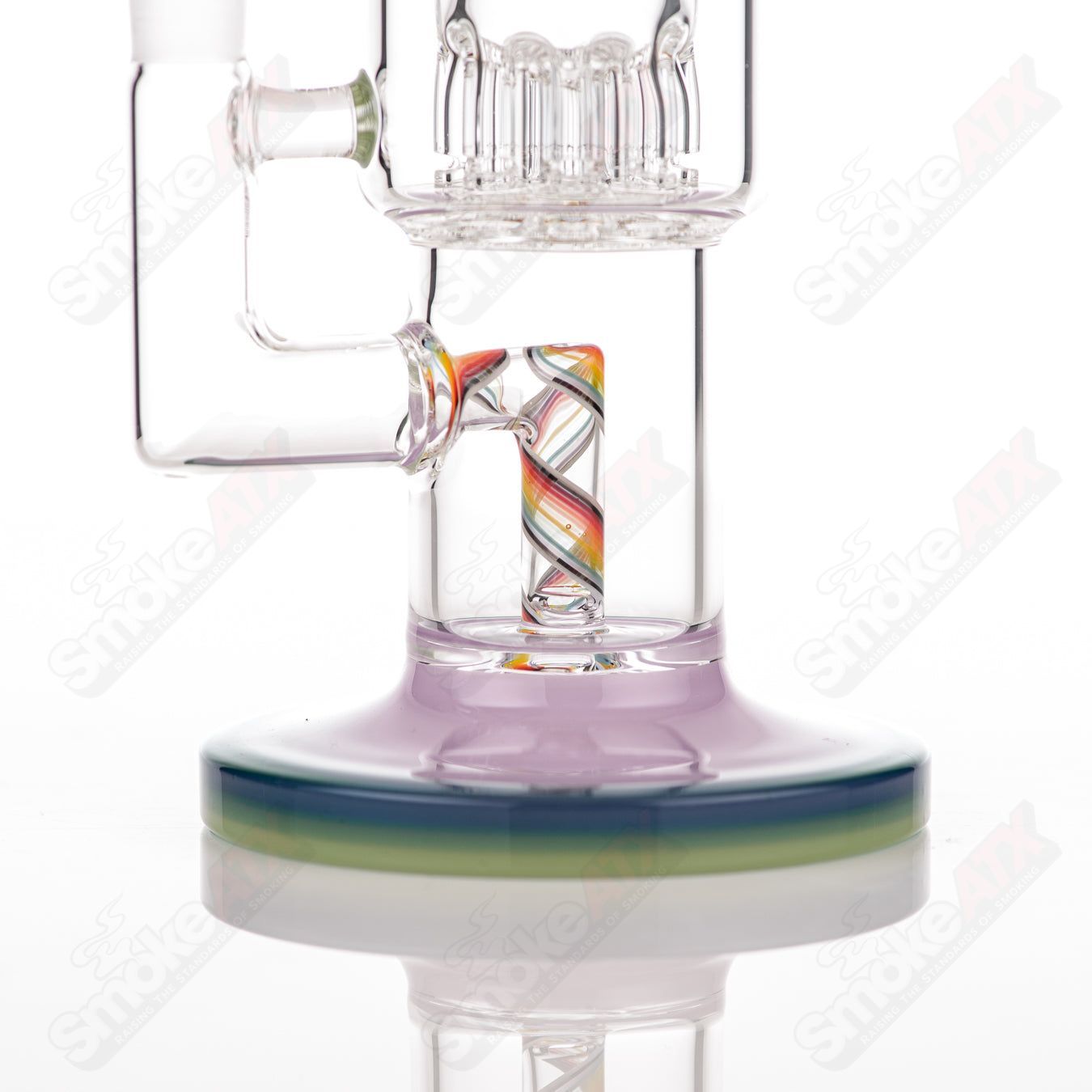 Toro Double Macro 8-Arm Tree Concentrate Rig with full color UV accent foot and mouthpiece, made of glass.