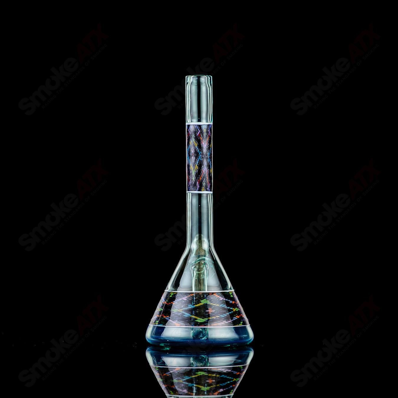 John W Glass Filla Tube concentrate rig, heady glass design with intricate details and vibrant colors for dabbing concentrates.