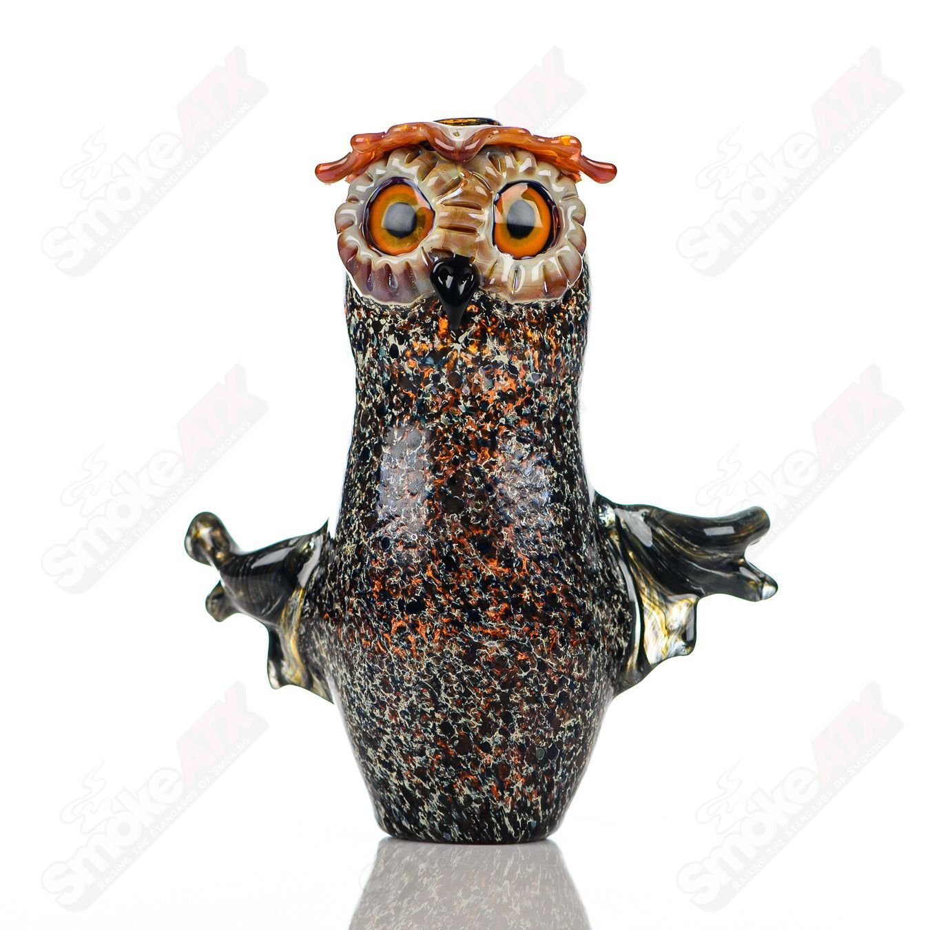 Glass pipe by Four Winds Flameworks featuring a vibrant hooter design with colorful glass details.