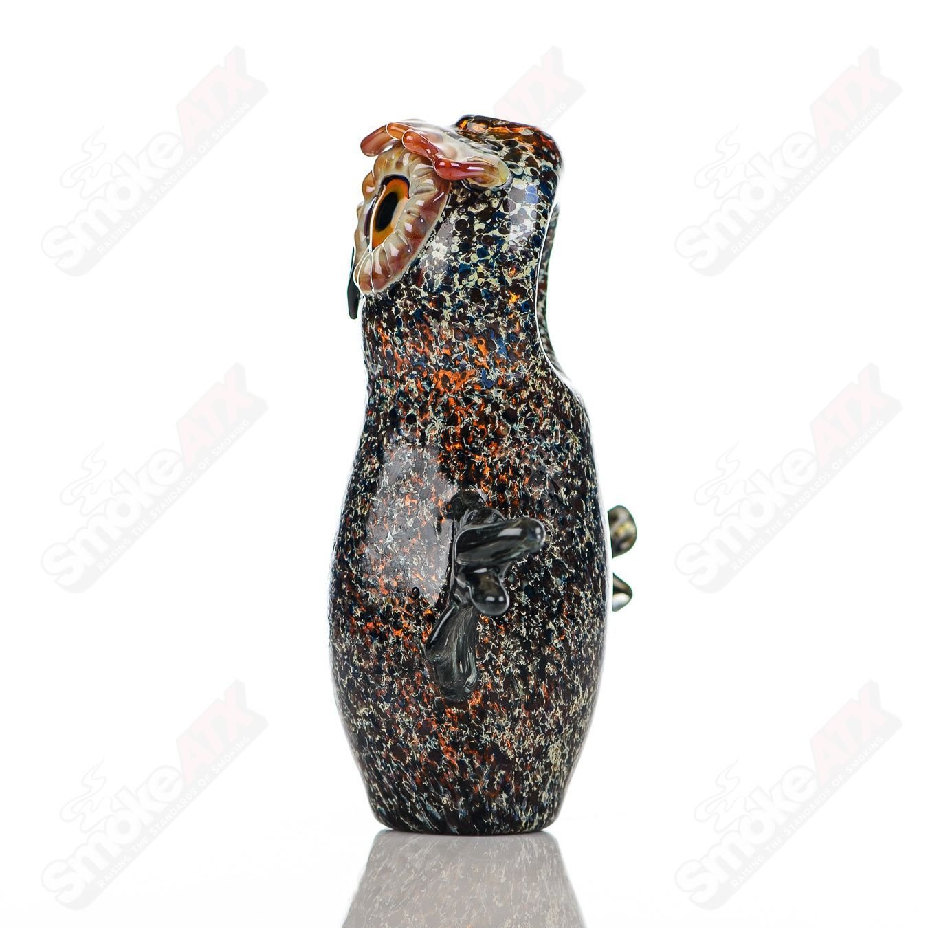 Glass pipe by Four Winds Flameworks featuring a colorful hooter design with intricate glasswork details.