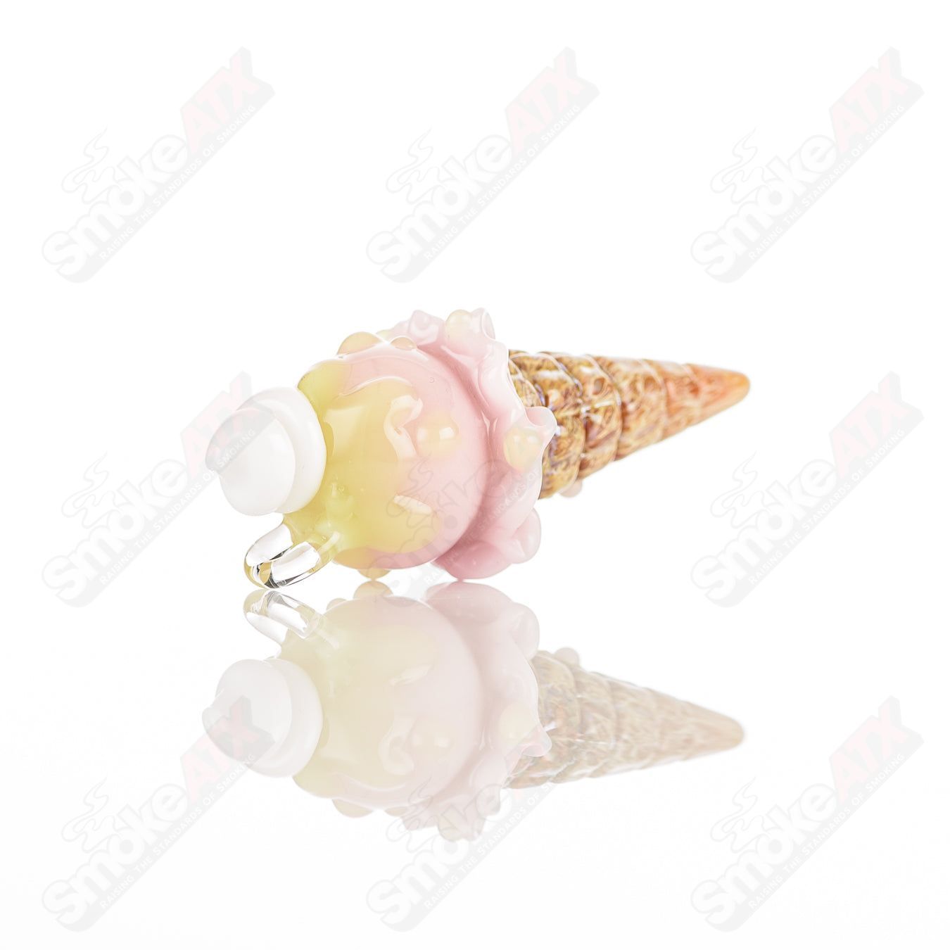 Large glass cone pendant by Sweet Shop Glass featuring vibrant Renee Patula design, hangs as a decorative jewelry piece.