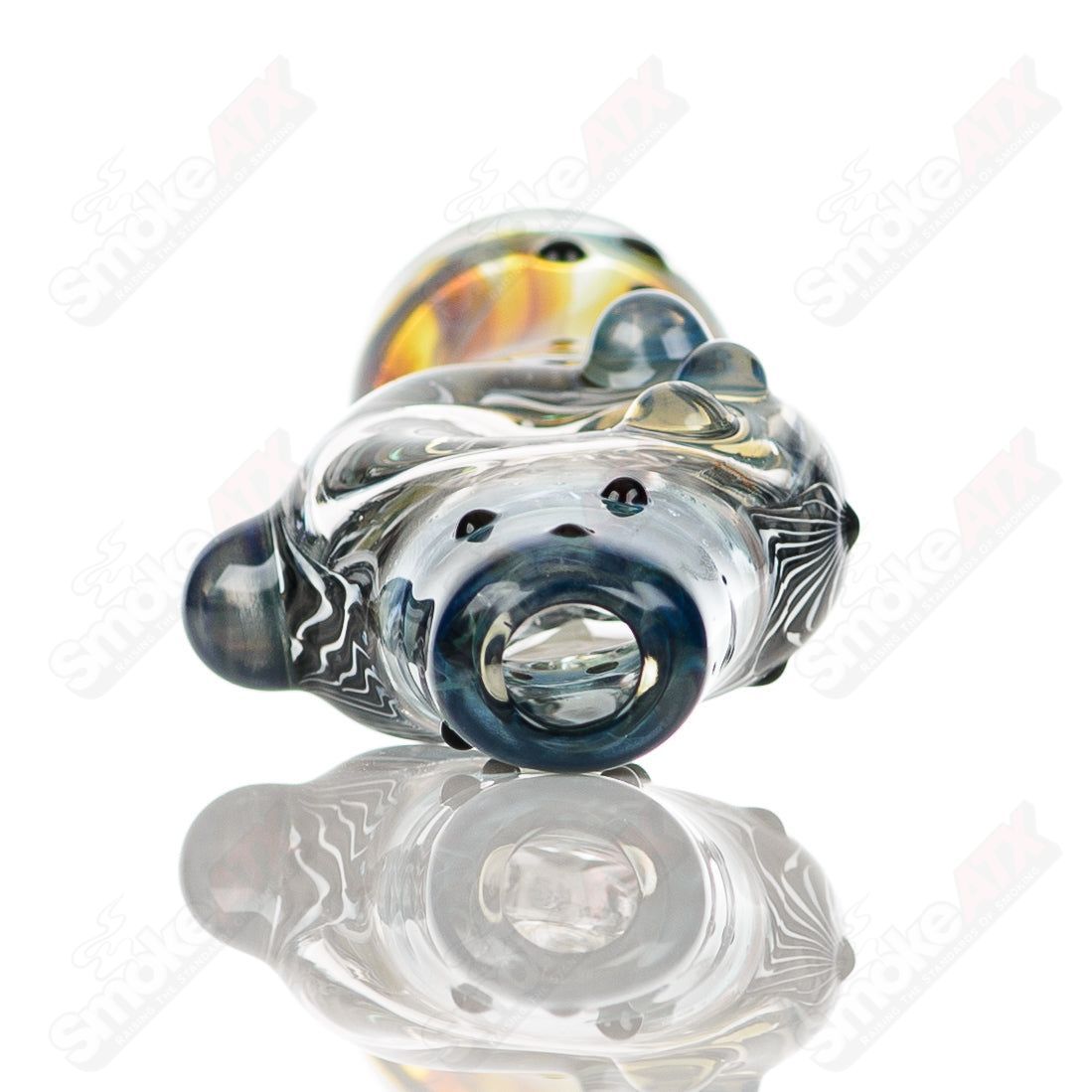 Large glass donut chillum by Baby Dabs, a colorful and detailed smoking pipe featuring a donut design and a compact, handheld shape.