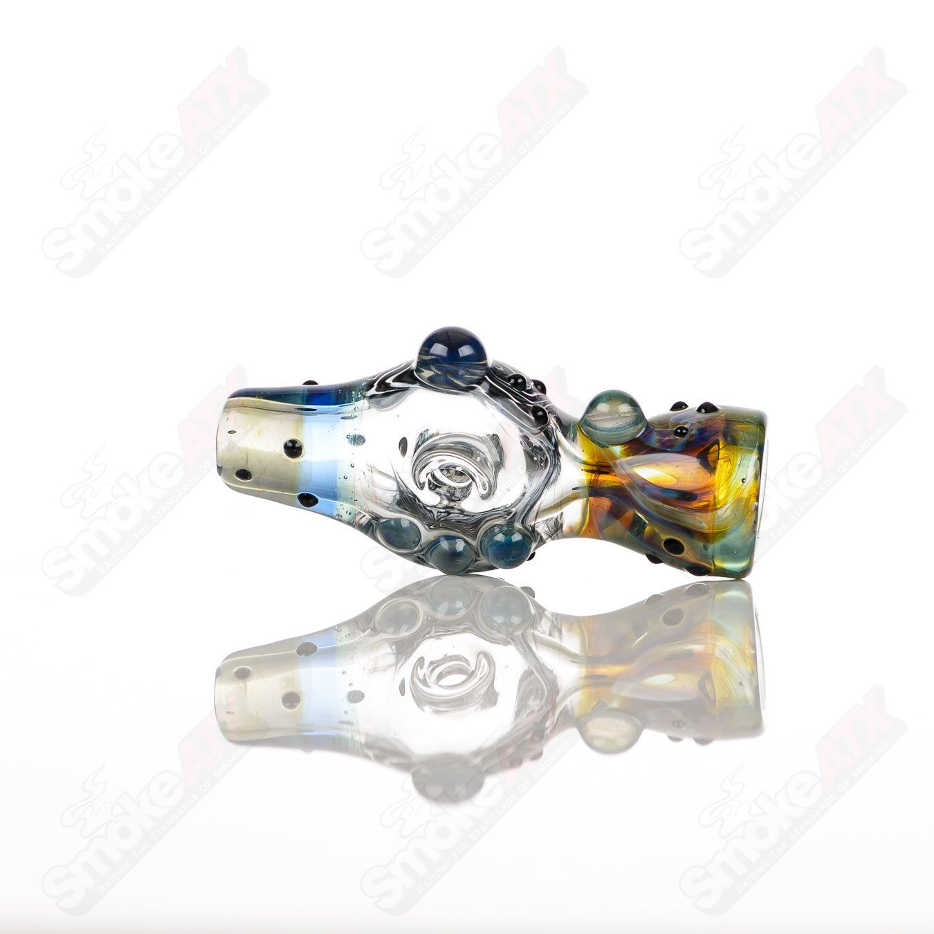 Large glass Donut Chillum by Baby Dabs, featuring a colorful donut design and compact shape for easy use.