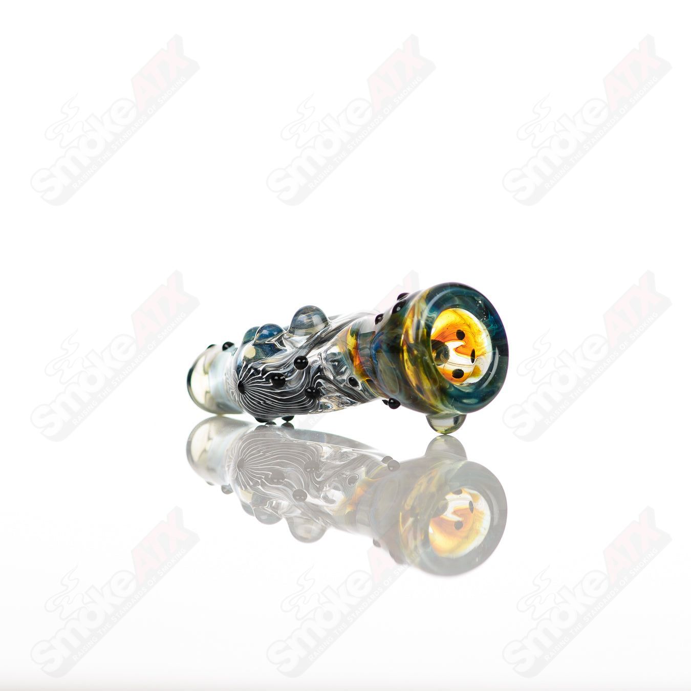 Large glass Donut Chillum by Baby Dabs, colorful donut-shaped chillum for dabbing, with intricate glasswork and vibrant details.