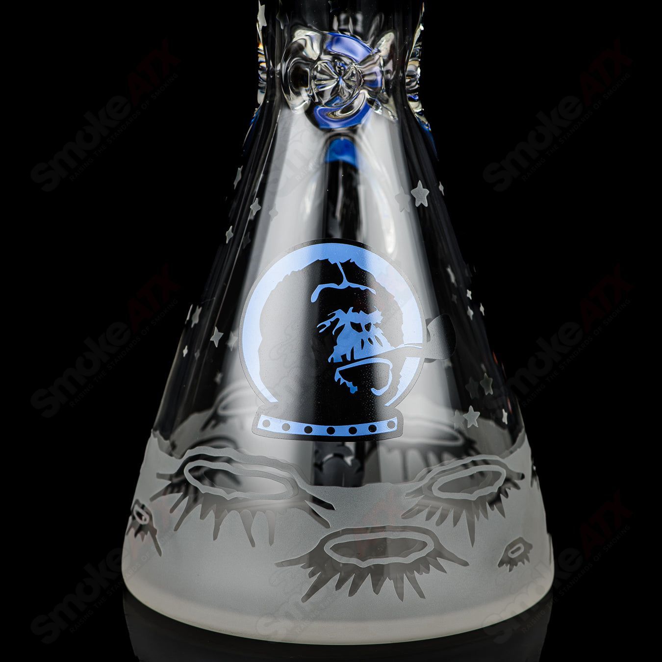 Blue Cheese Blasted Space Cadet beaker by Illadelph, a clear glass heady beaker with vibrant blue accents and detailed design.