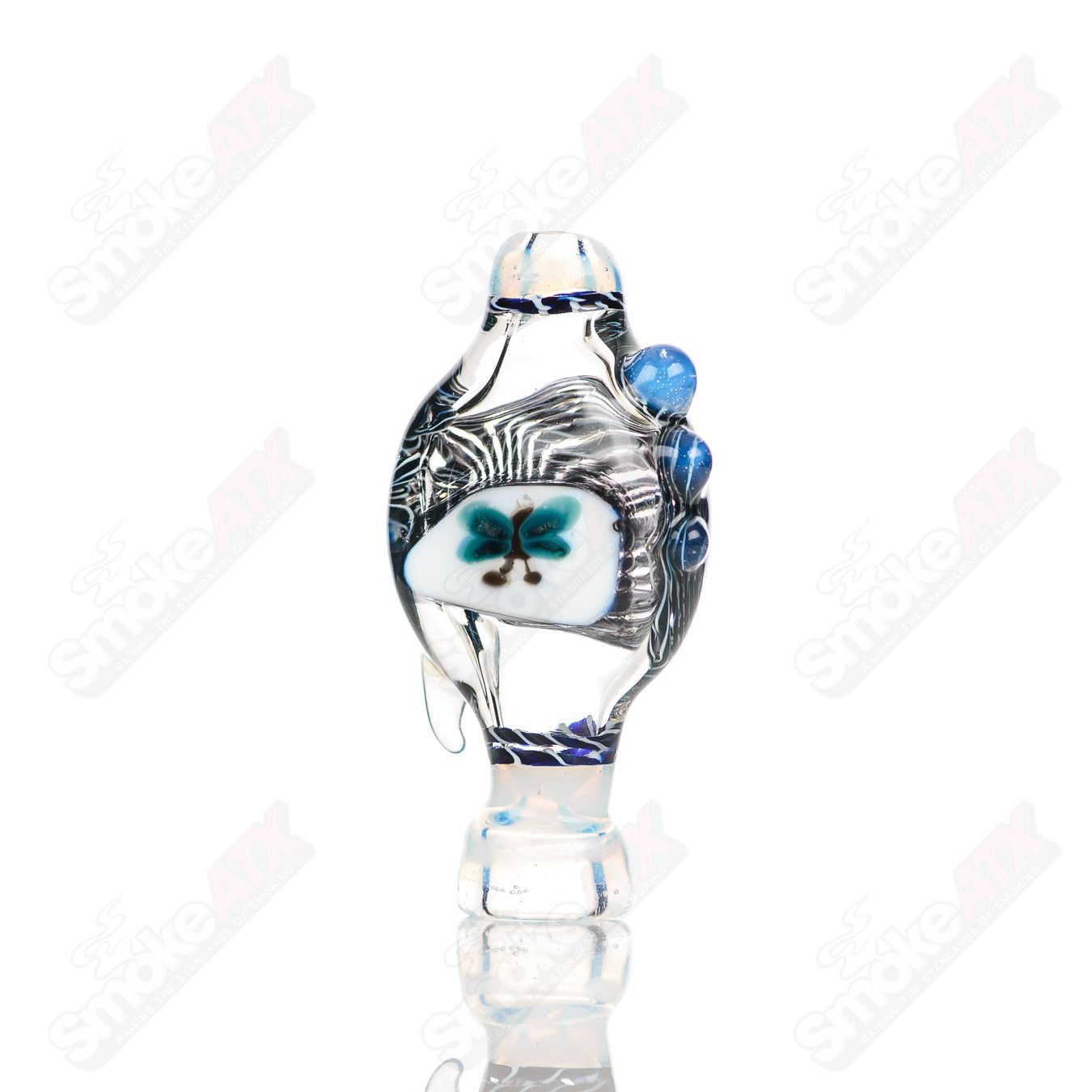 Small glass Chillum by Baby Dabs, designed for dabbing, featuring a compact, clear glass construction with a simple, functional design.