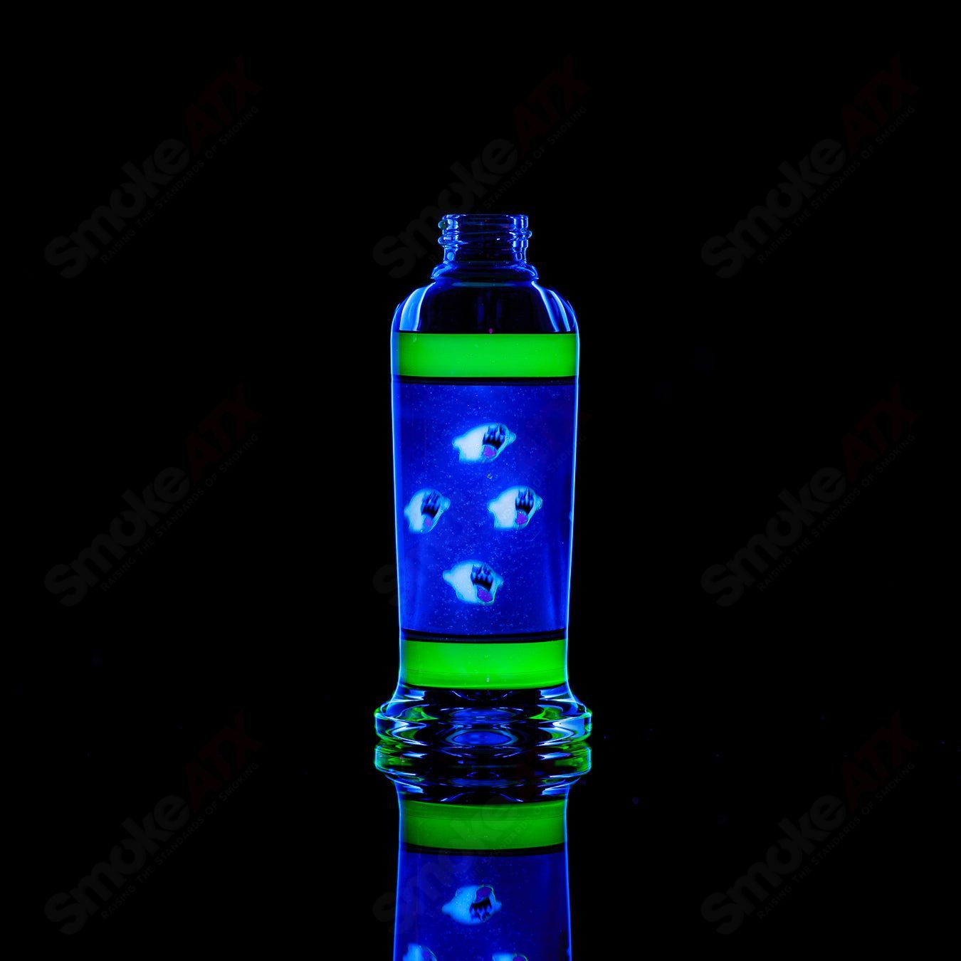Clear Heady Glass spray bottle labeled SPG x Micro by Micro Glass, with a sleek design and spray nozzle for easy use.