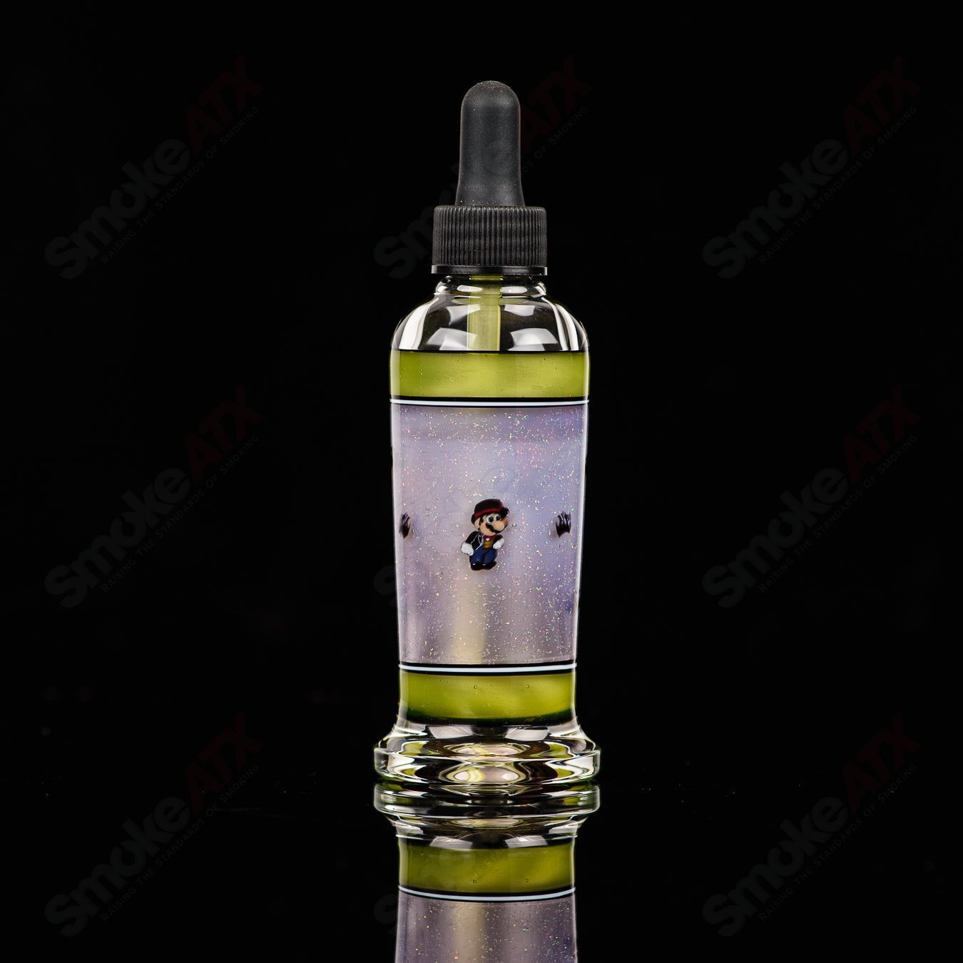 Micro Glass Heady Glass spray bottle with Micro SPG x Micro branding, clear glass with a functional spray nozzle.