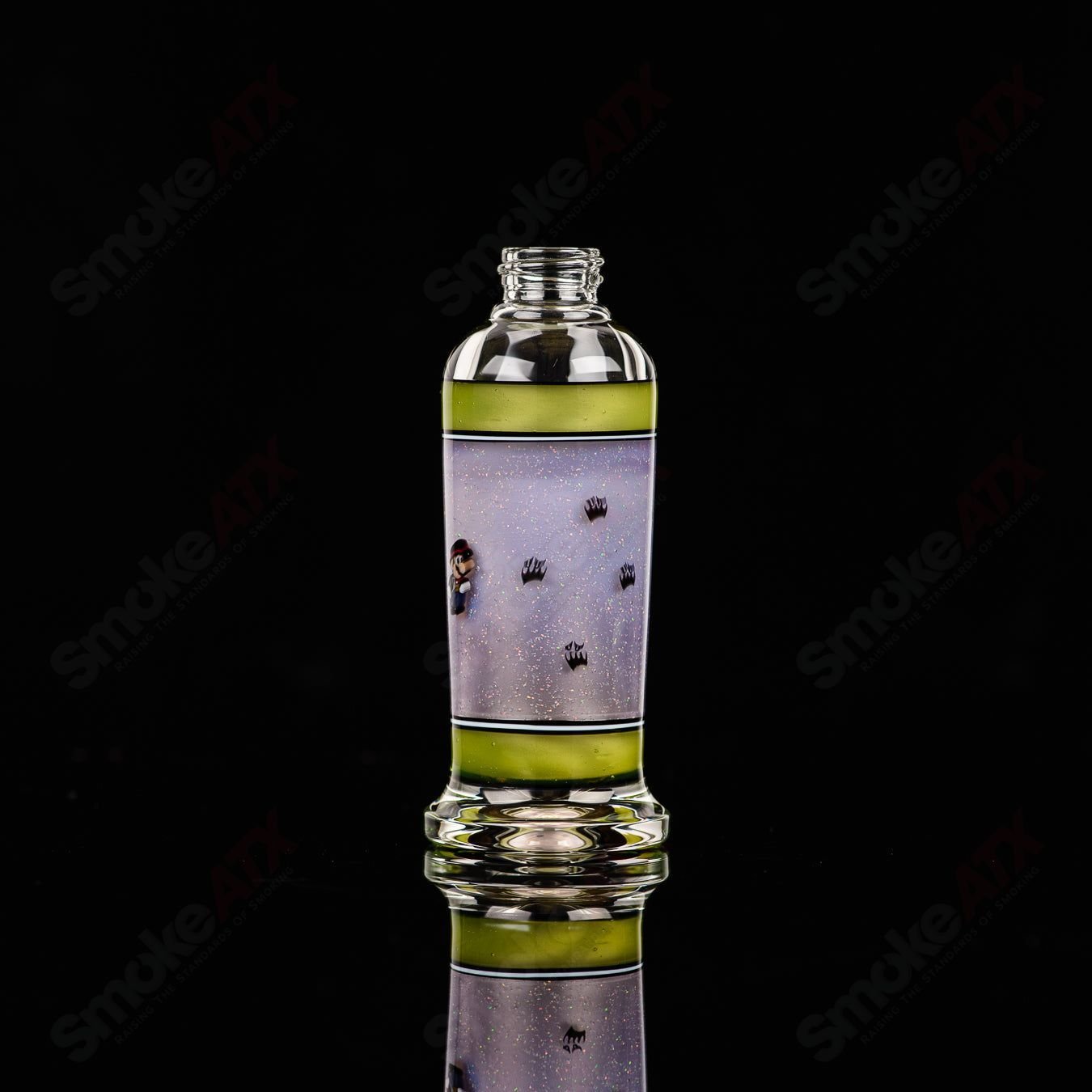 Micro Glass Heady Glass spray bottle with SPG x Micro branding, clear glass with a pump spray top.