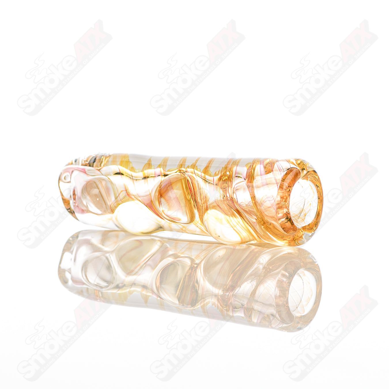 Texas Hot Glass Taster Texas Hot Glass chillum glass pipe, compact and clear with intricate design, for smoking enjoyment.
