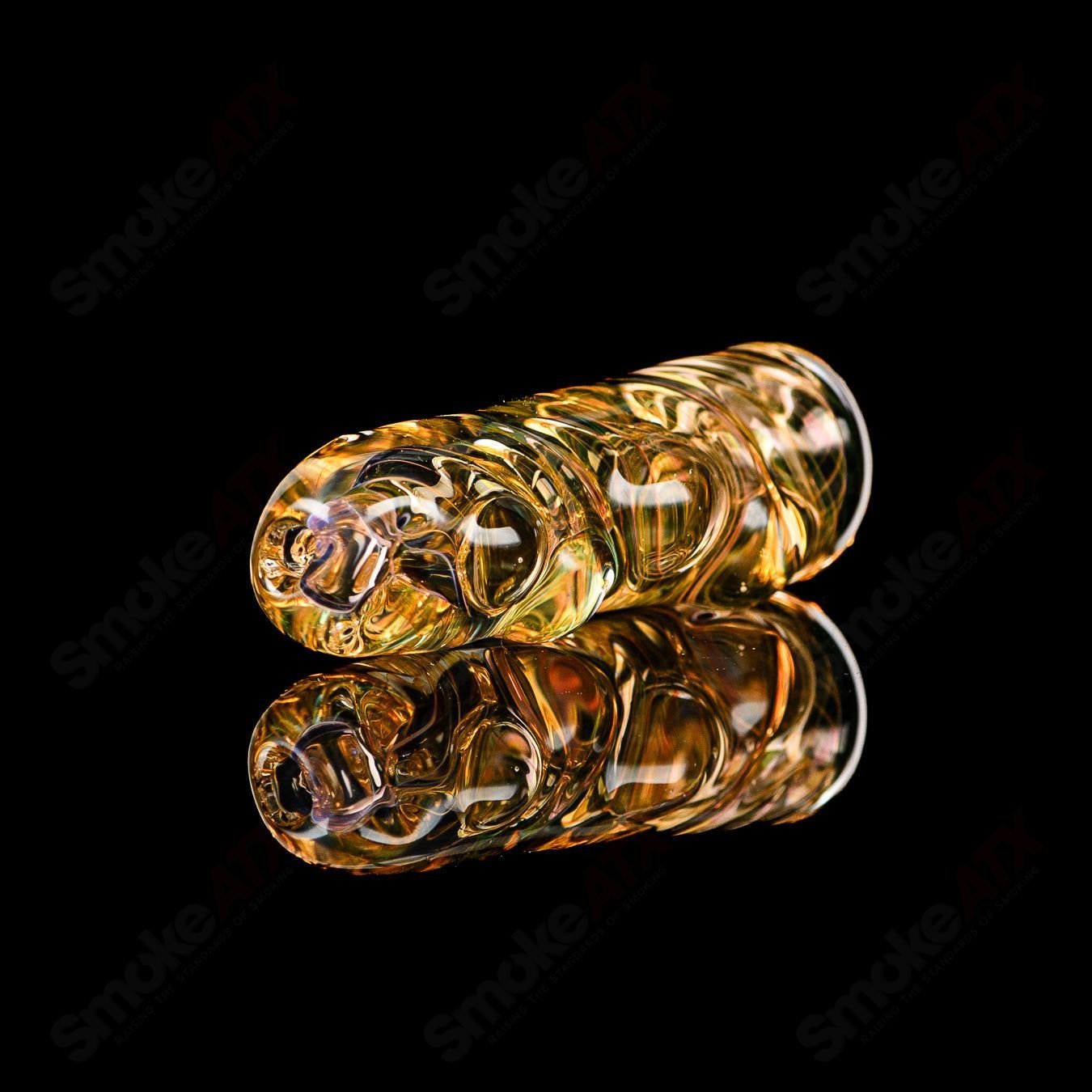 Clear Texas Hot Glass chillum with etched design, compact glass smoking pipe for tobacco or herbs.