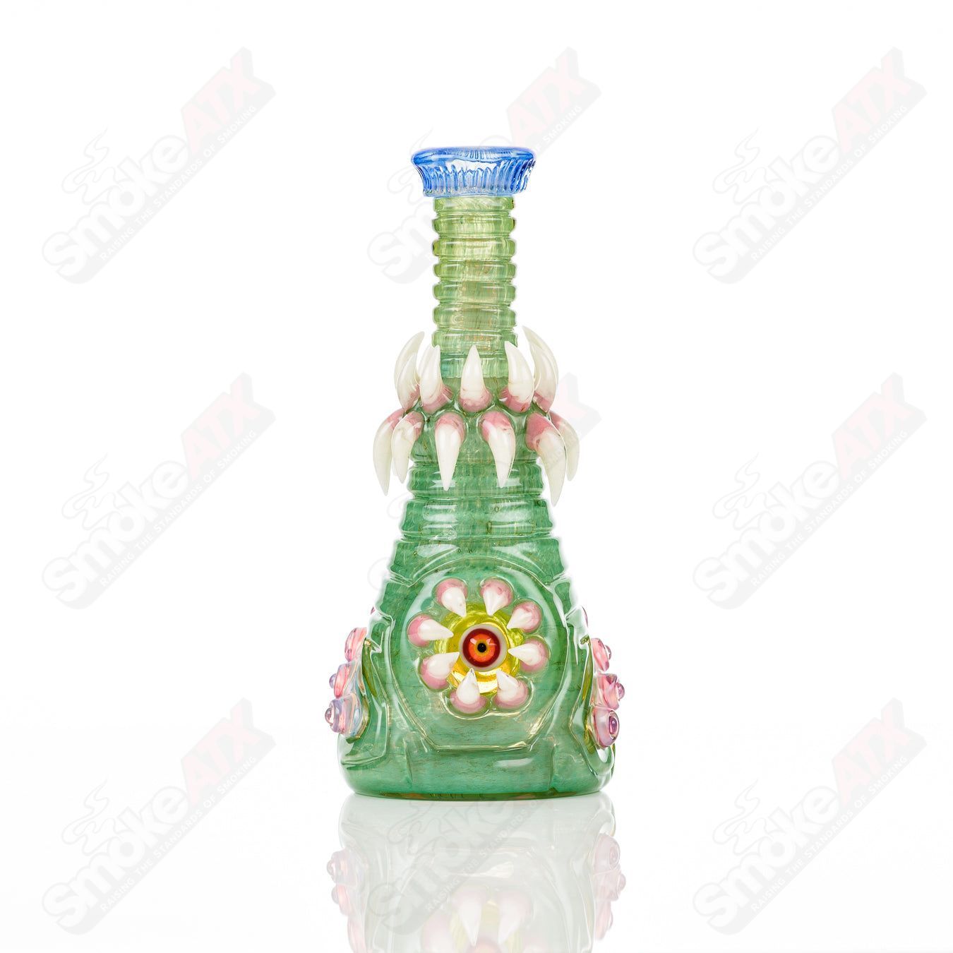 UV double barrelled Rip Curl concentrate rig by Salt Glass, featuring vibrant glass design and intricate heady glass craftsmanship.