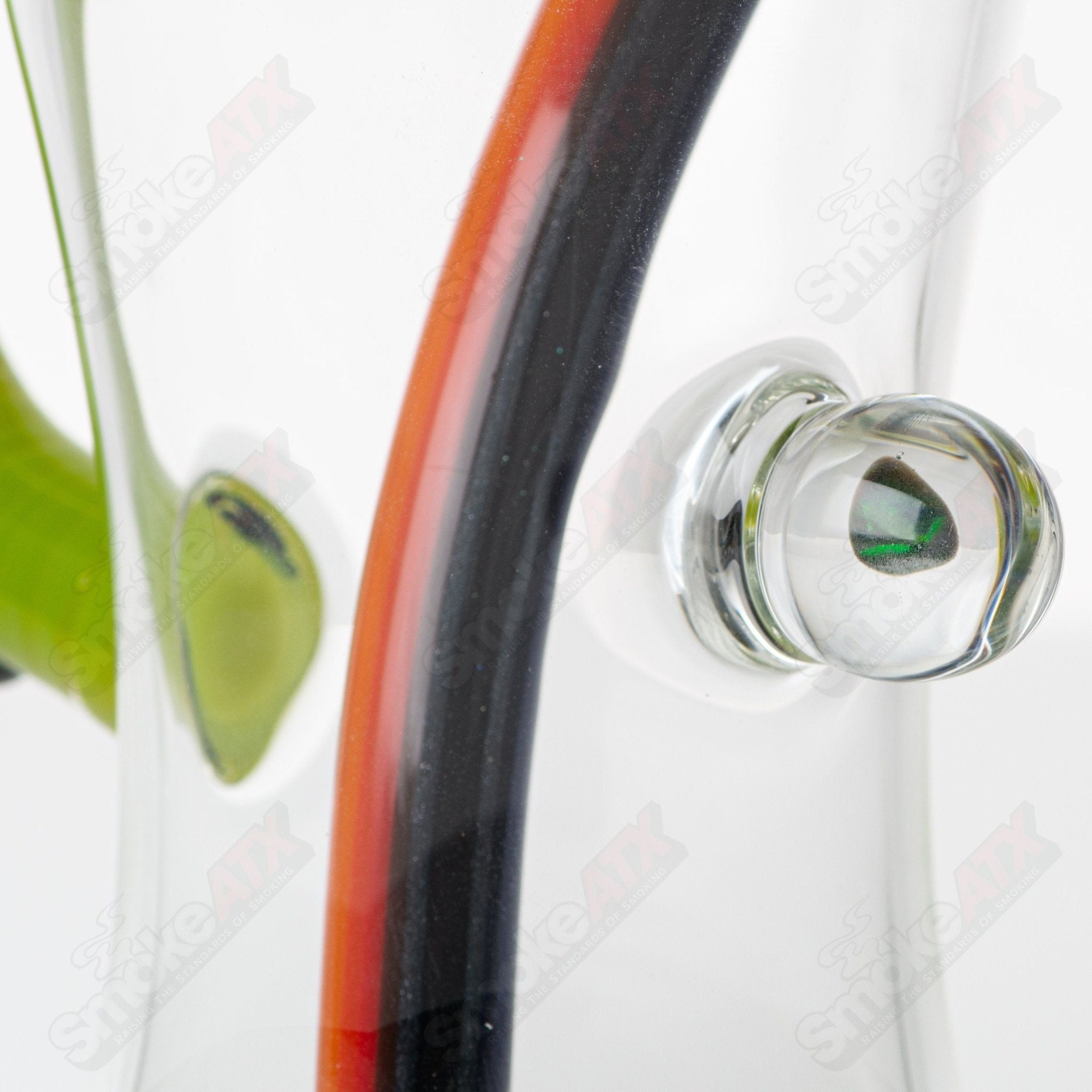 Devo Heady Glass Wig Wag Tube with Slide Devo beaker-style water pipe featuring colorful wig wag design and slide mechanism.