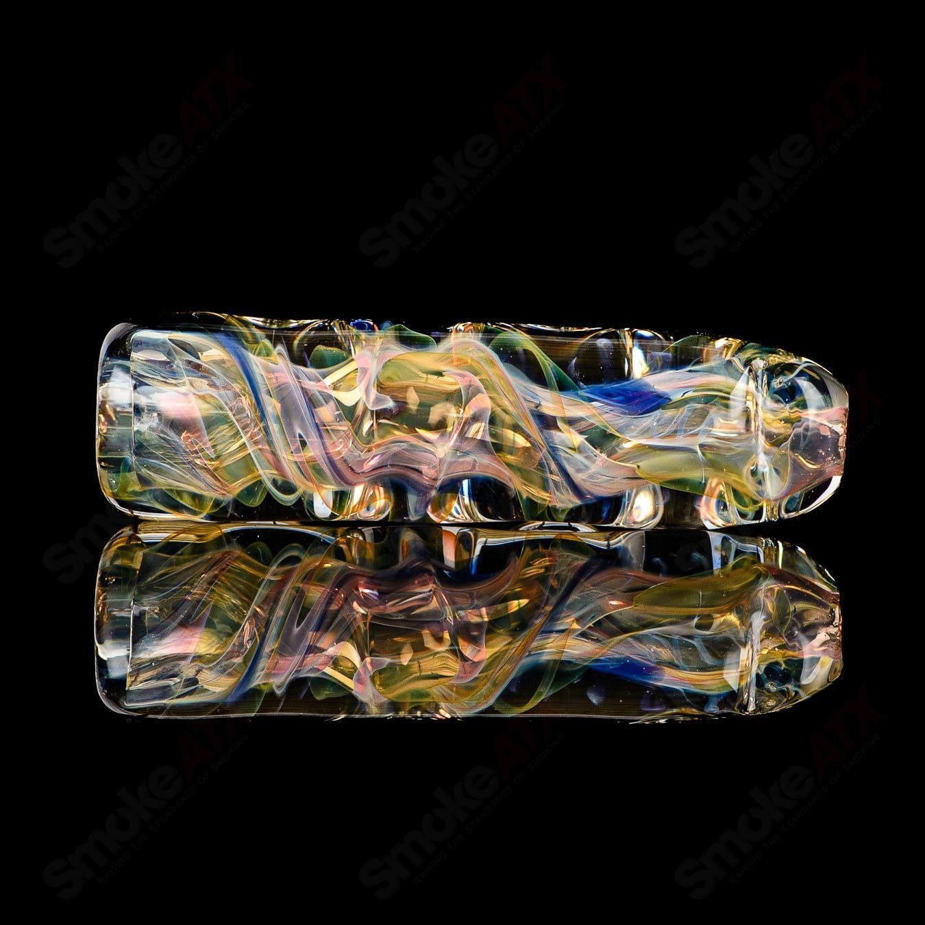 Clear glass #10 Taster Texas Hot Glass chillum pipe with a smooth, rounded design for smoking.