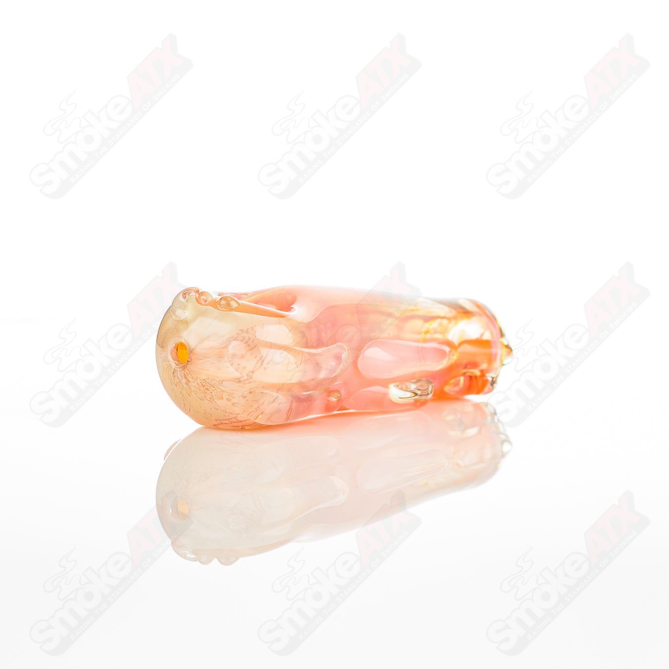 Glass pipe featuring a spoon-shaped bowl, branded Nobody, made from clear glass with a smooth, rounded design.
