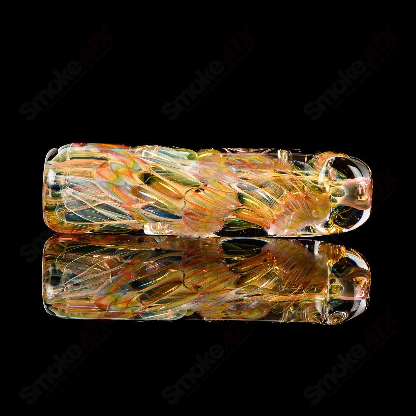 Texas Hot Glass #12 Taster Chillum, clear glass smoking pipe with a smooth, rounded shape and compact design.