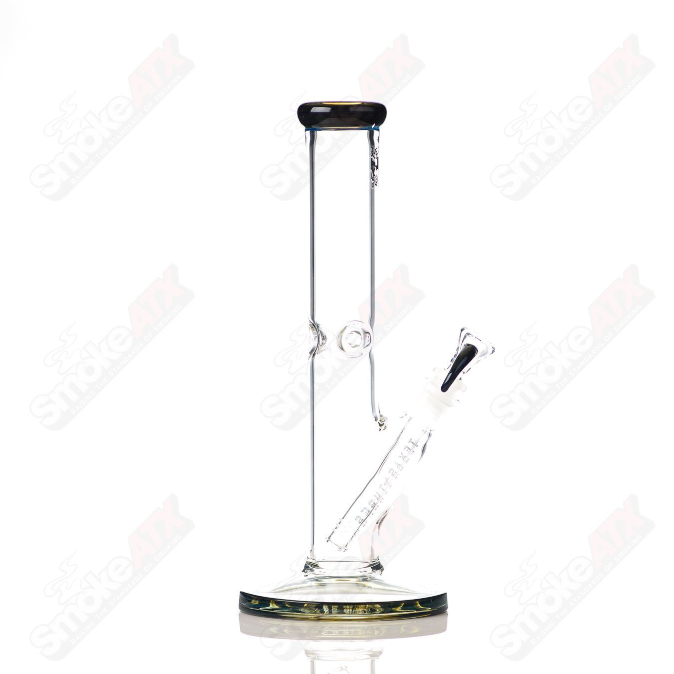 Blue-green 12-inch 14mm glass straight tube by Texas Tubes, featuring clear glass with colorful accents and a straight design.