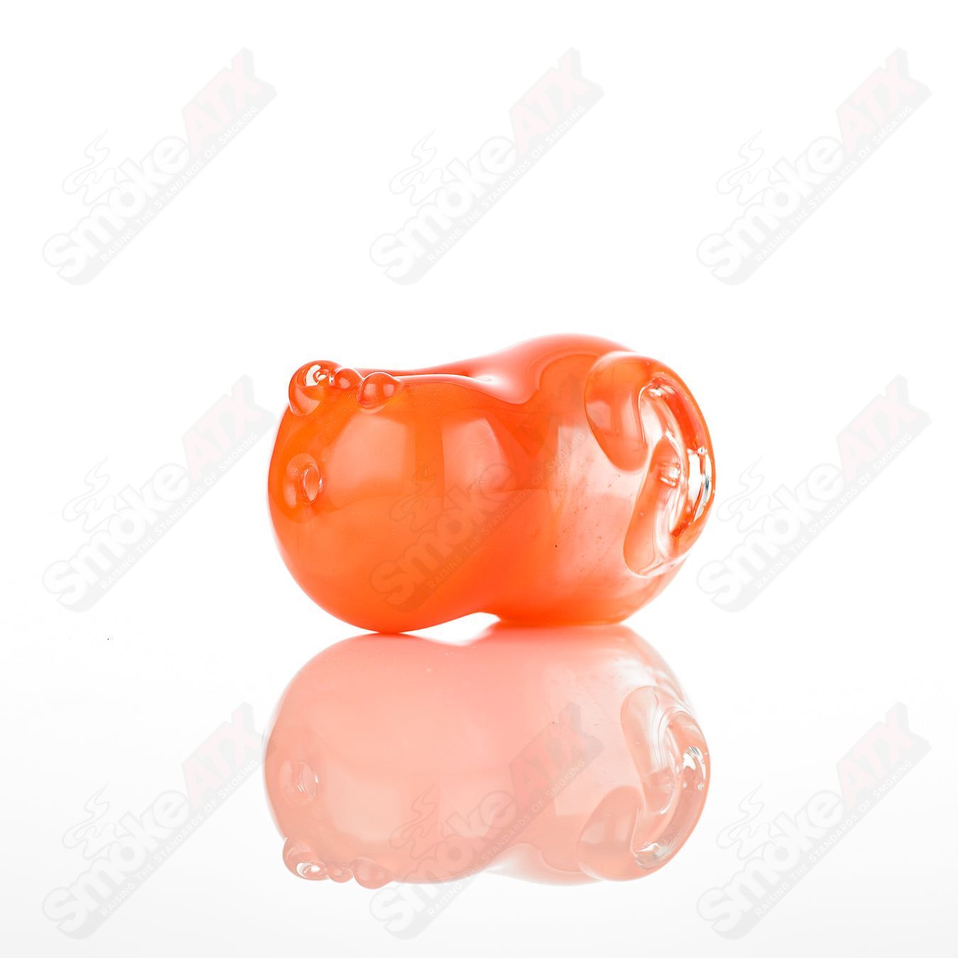 Glass pipe called the #14 Bean Spoon by Nobody, featuring a clear glass construction with a rounded bowl and smooth design.