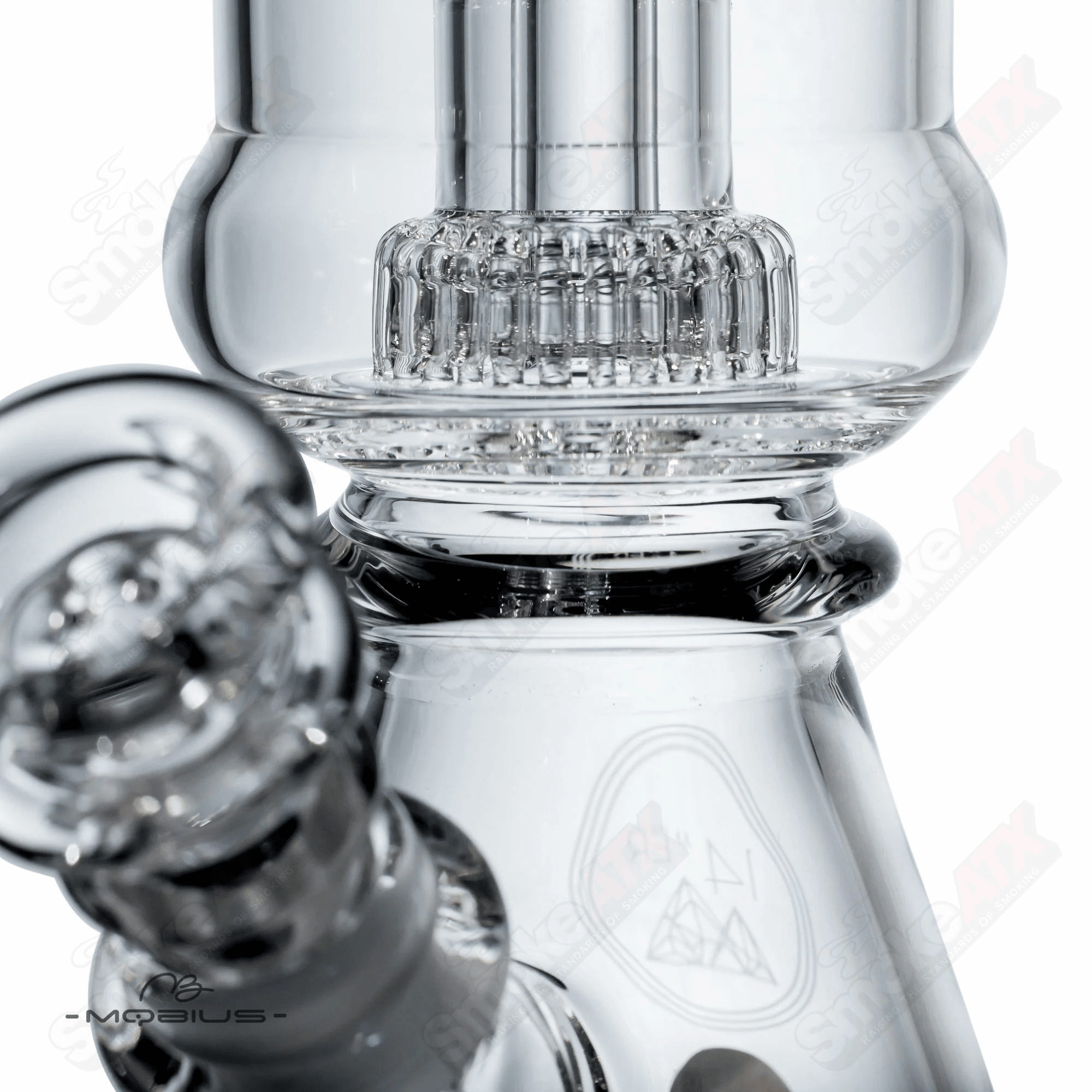 Glass beaker from Mobius 14'er Mobius line, clear laboratory glassware with measurement markings and a wide opening.