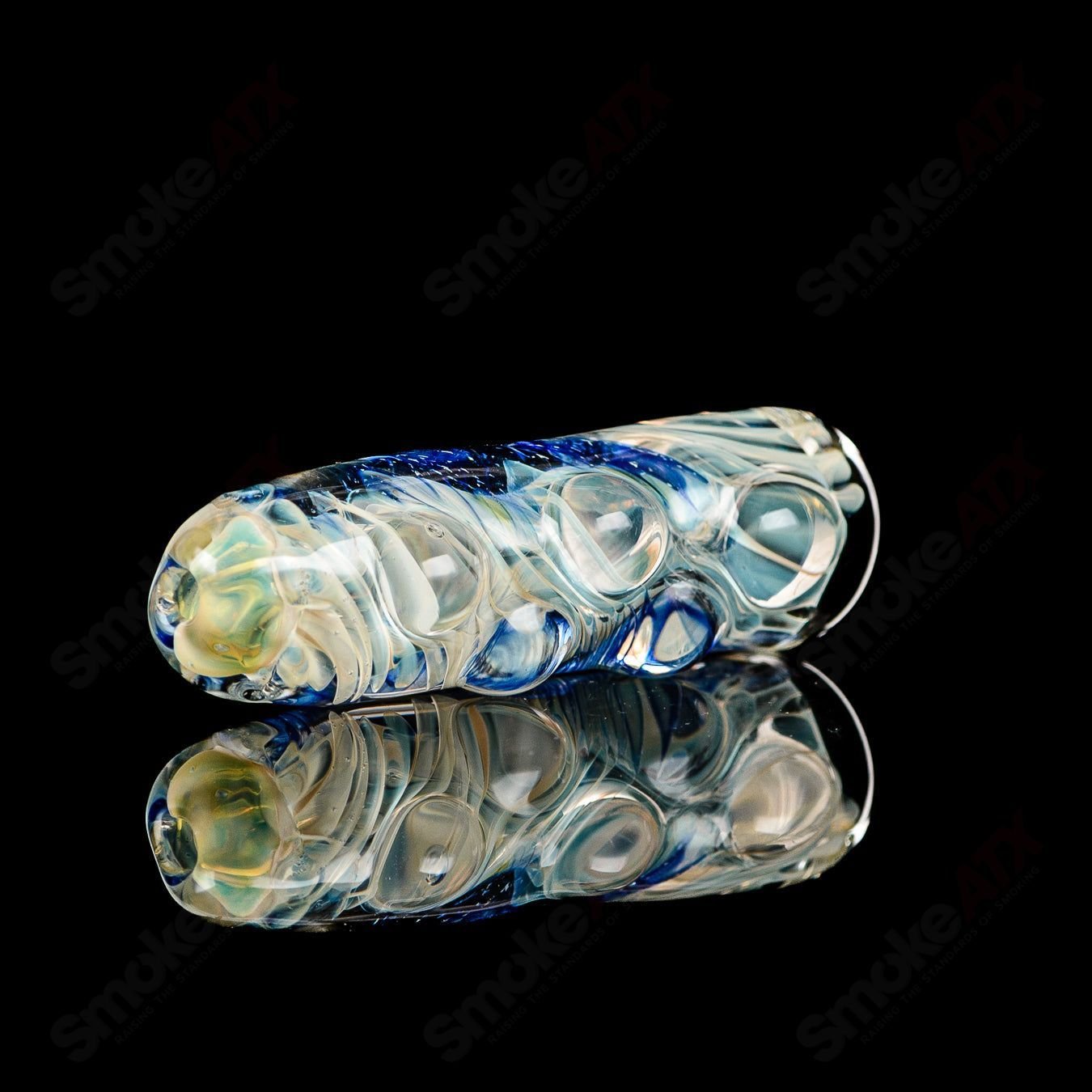 Texas Hot Glass Taster #15 Chillum glass pipe with clear glass design and compact shape for easy handling.