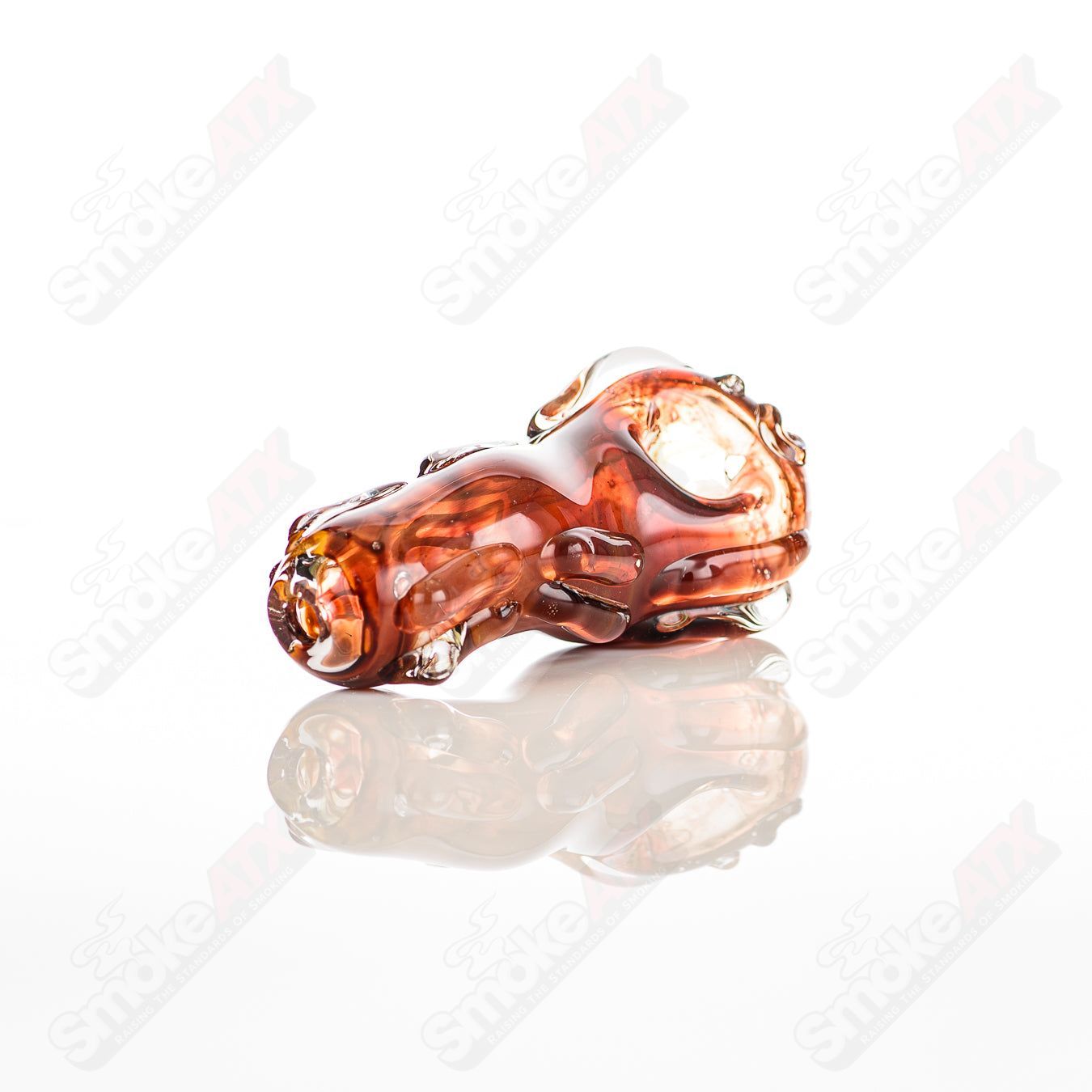 Glass pipe called #16 Spoon Glass by Nobody, clear glass with a rounded bowl and smooth stem, designed for smoking.