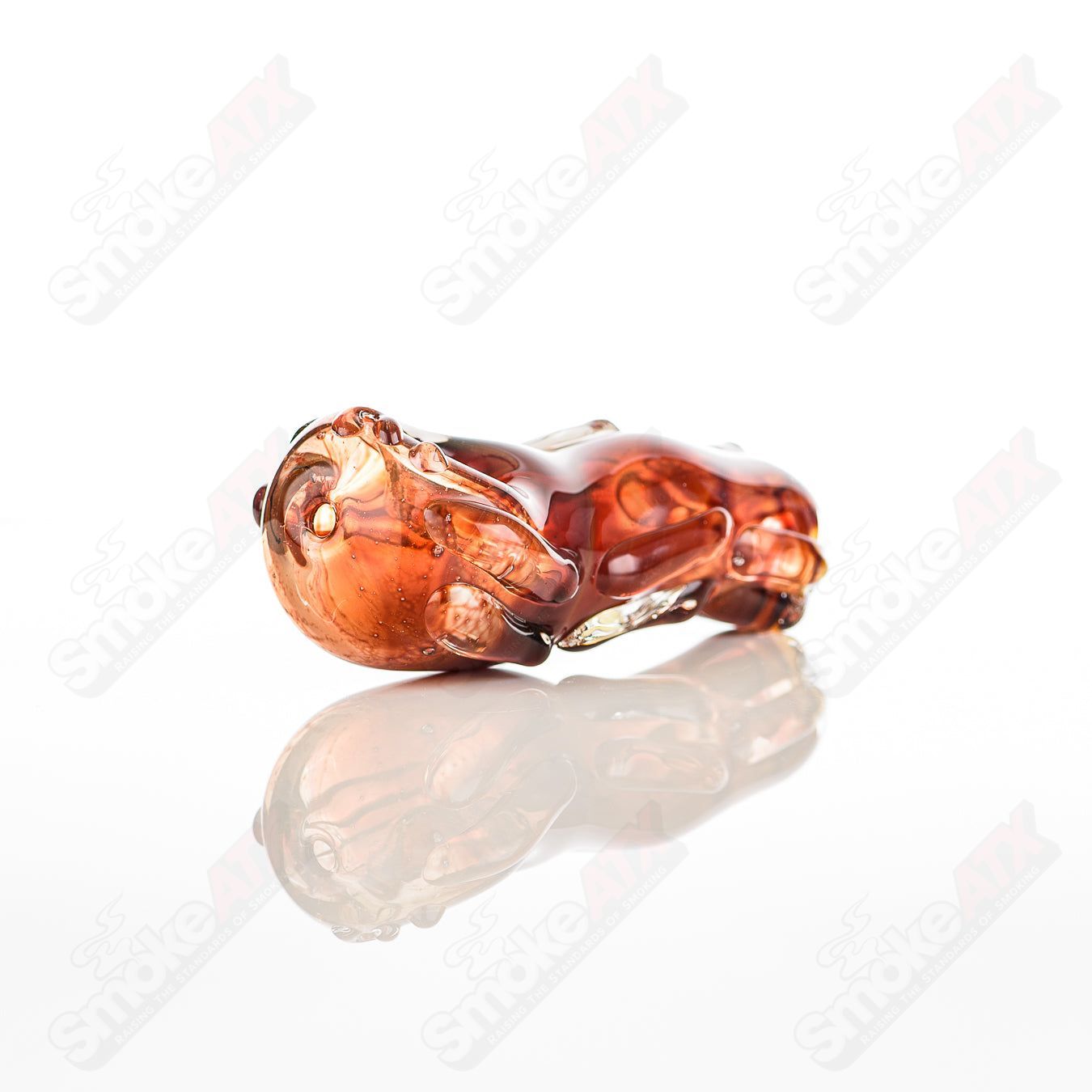 Glass pipe called #16 Spoon by Nobody, clear glass with a smooth bowl and long stem, designed for smoking purposes.