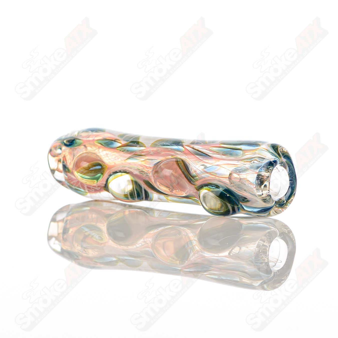 Clear Texas Hot Glass Taster chillum, small hand pipe with a rounded bowl and straight neck, designed for smoking.