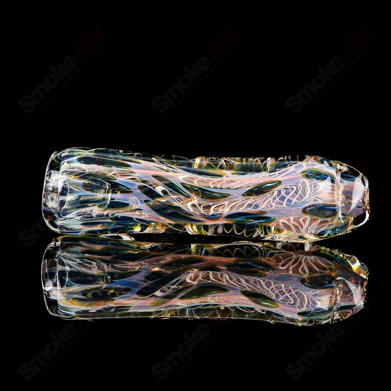 Clear Texas Hot Glass Taster Chillum with a simple cylindrical shape, designed for smooth smoking experiences.