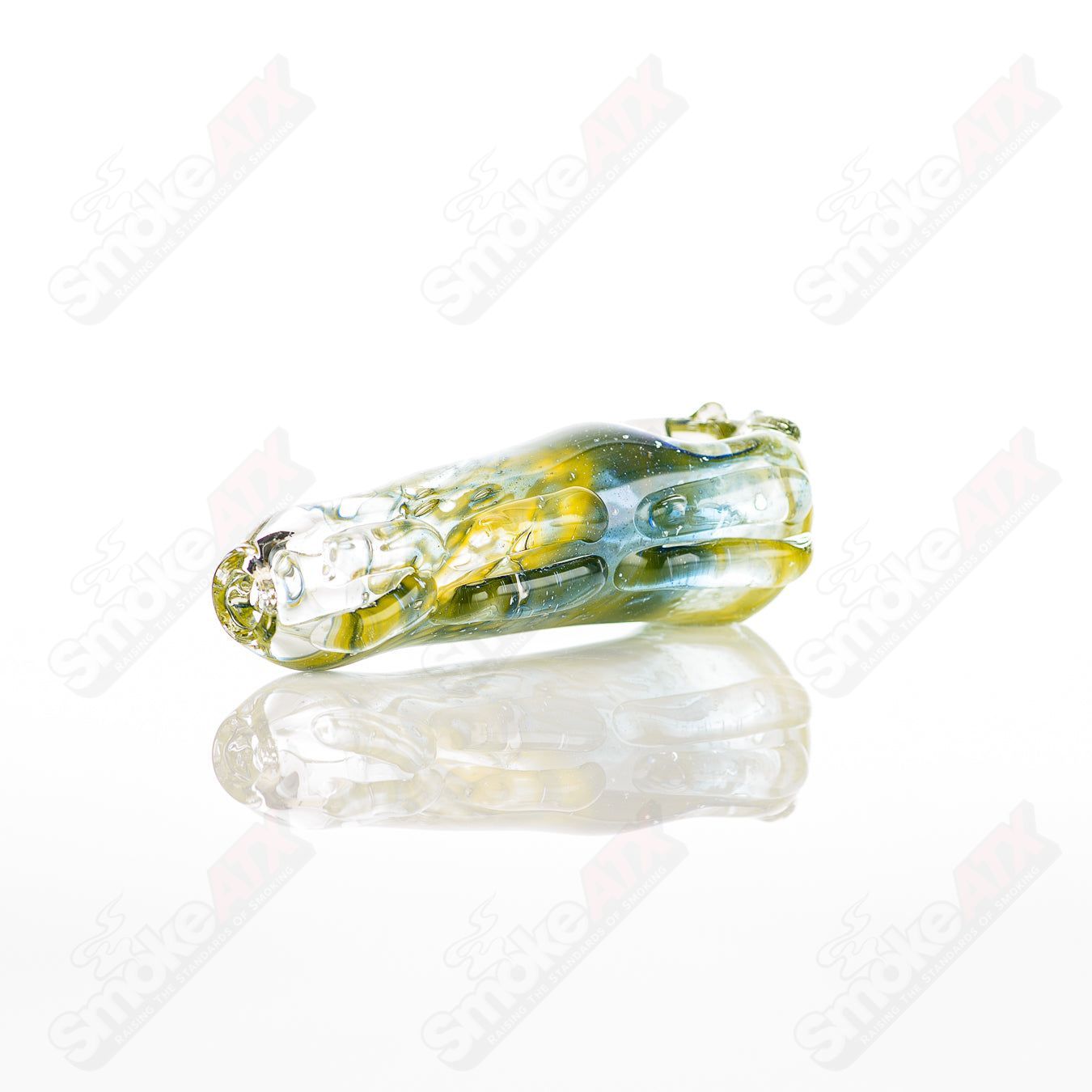 Glass pipe in the #18 Spoon Glass by Nobody, featuring a clear, smooth glass design with a rounded bowl and elongated stem.