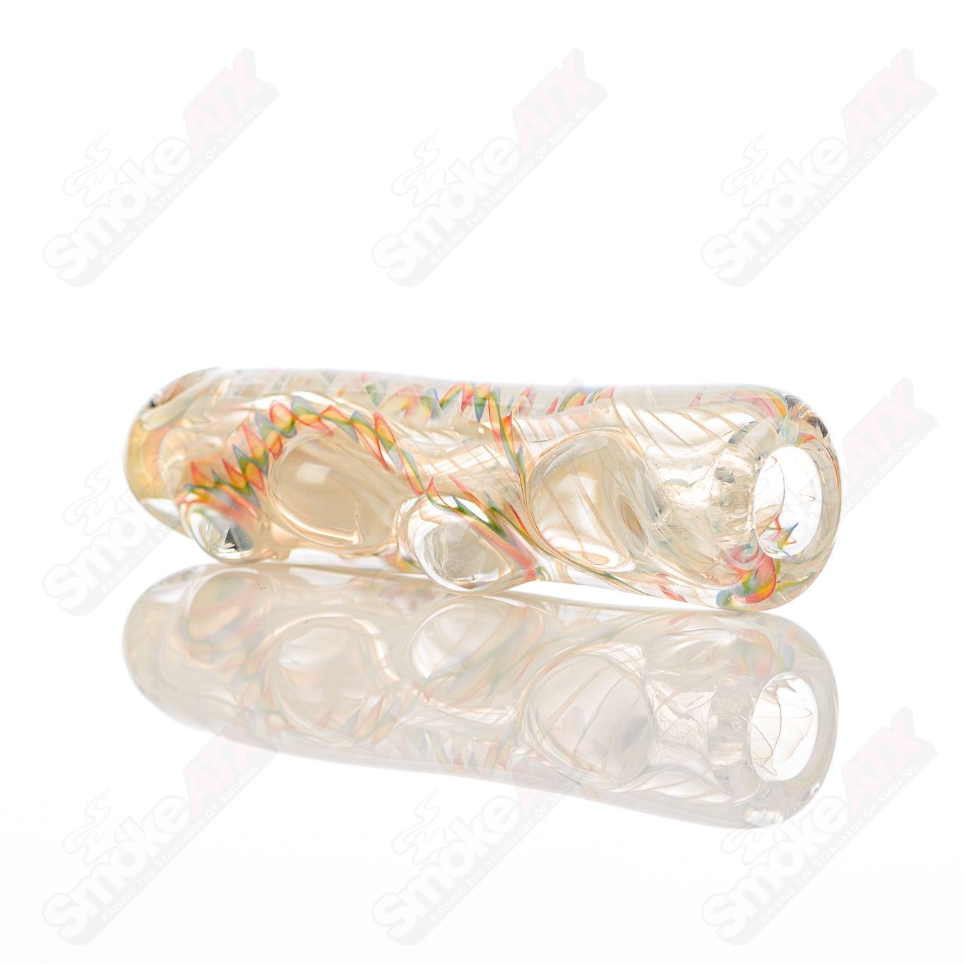 Texas Hot Glass 18 Taster Texas Hot Glass chillum glass pipe, clear and compact with a smooth, rounded shape for easy handling.