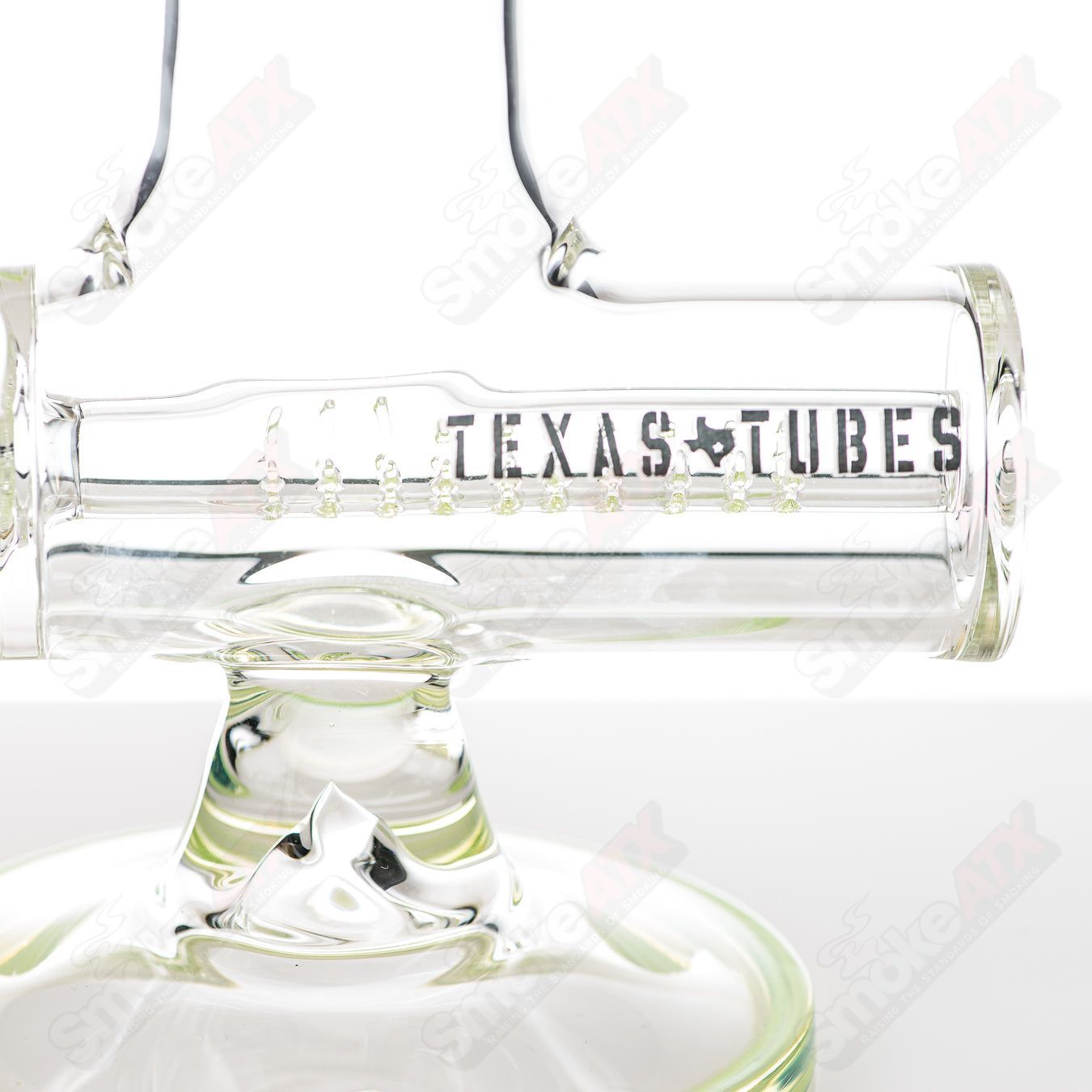 18-inch Texas Tubes glass inline bong with 18mm joint and 8-arm green Slyme design, featuring a straight tube style.