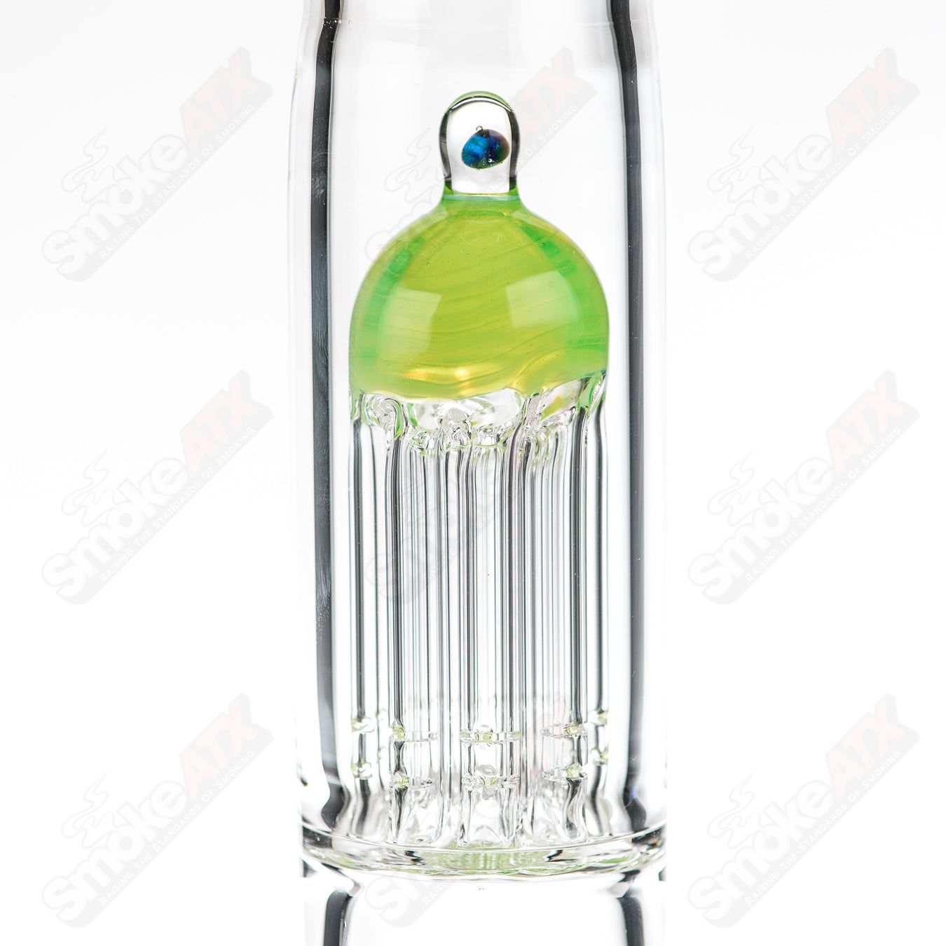 18-inch Texas Tubes glass inline to 8-arm green Slyme straight tube with 18mm diameter, featuring intricate design details.