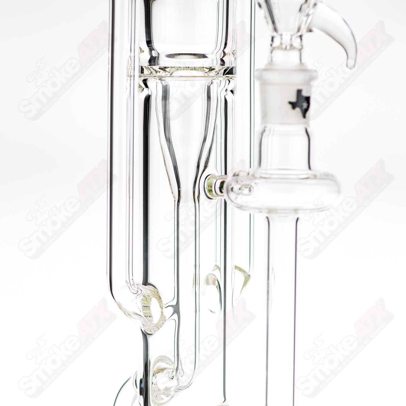 18-inch Texas Tubes Klein Recycler glass bong with twin 18mm uptake tubes and intricate recycler design.