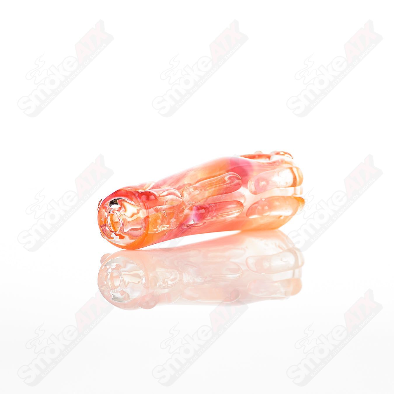 Clear glass spoon pipe by Nobody featuring a smooth, rounded bowl and a curved mouthpiece for smoking enjoyment.