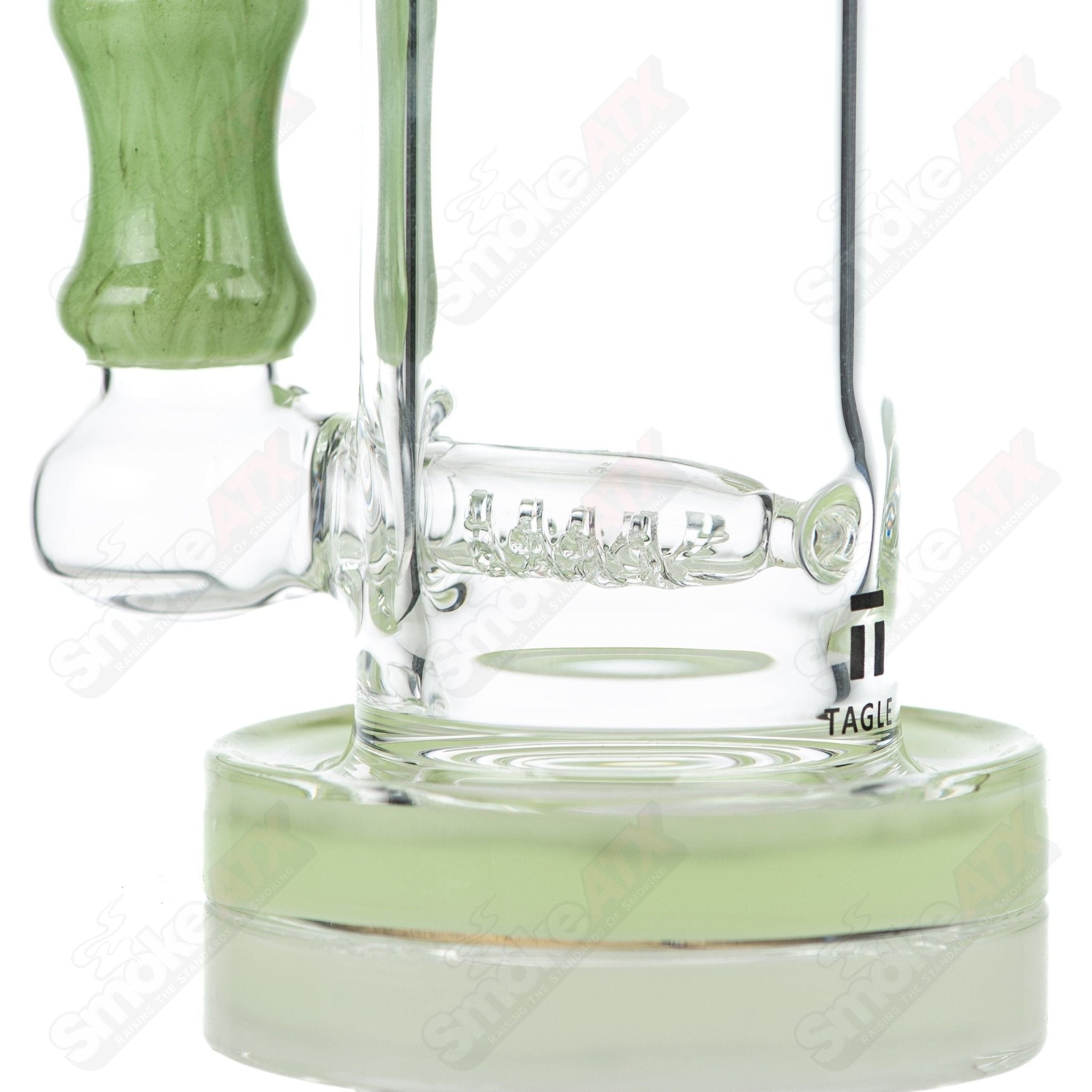 Tagle Glass 18mm and 50mm wrap n rake inline tube bubbler with clear glass design and intricate detailing.