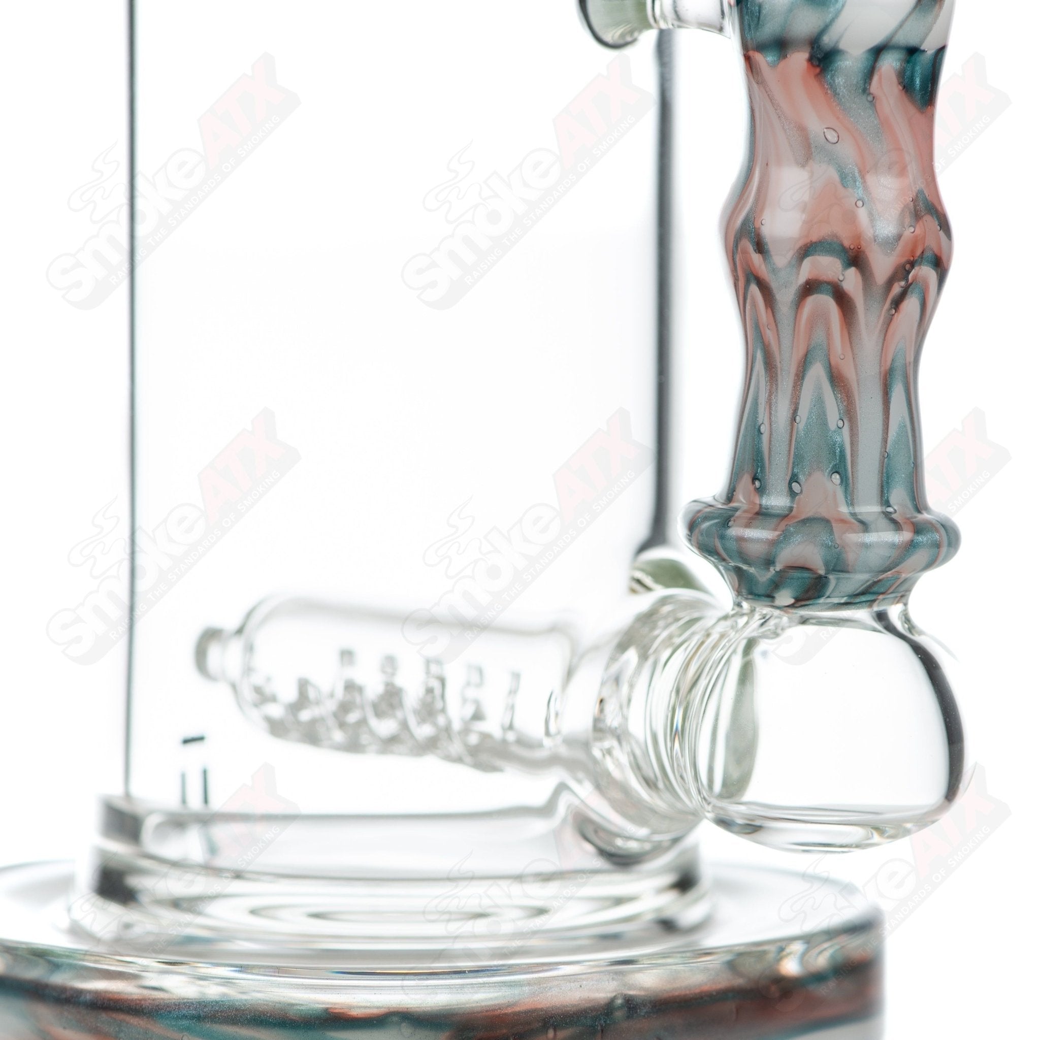 Tagle Glass inline tube waterpipe with 18mm and 60mm wrap and rake design, made of clear glass for smooth smoking experience.