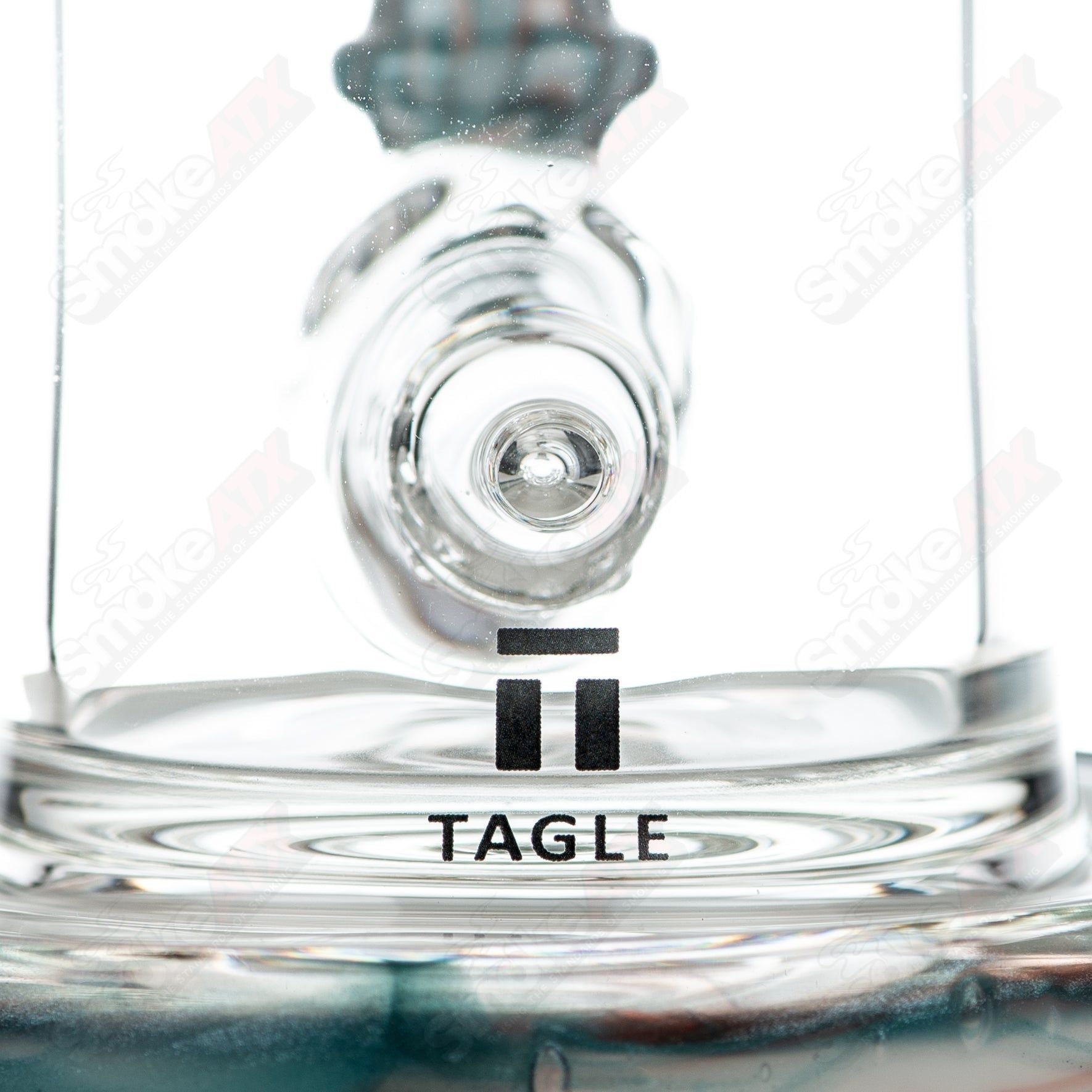 Tagle Glass 18mm 60mm Wrap n Rake Inline Tube waterpipe made of clear glass with intricate design details