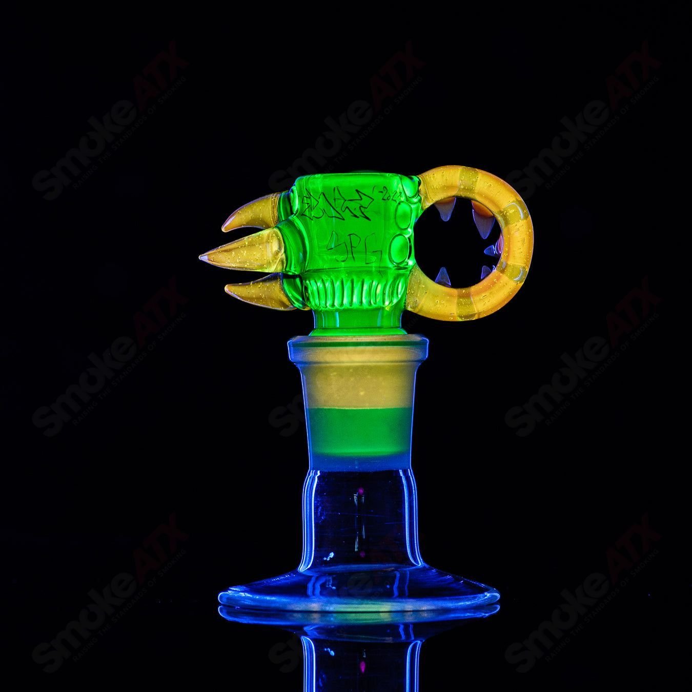 Salt Glass UV reactive 19mm 3-hole slide for Heady Glass bowls, featuring vibrant UV-reactive design and high-quality craftsmanship.