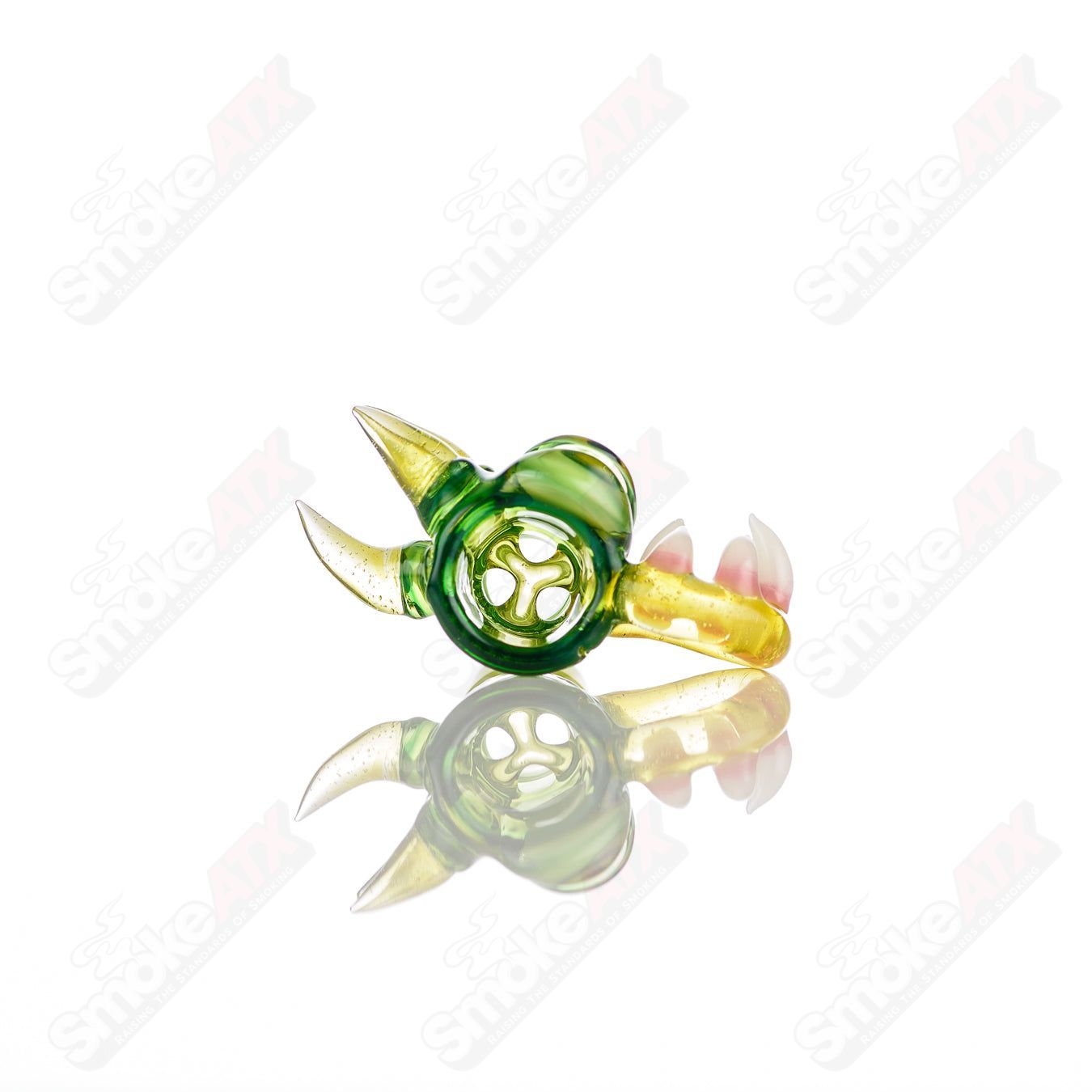 Salt Glass UV reactive 19mm 3-hole slide bowl for Heady Glass, featuring vibrant colors and a unique UV-reactive design.