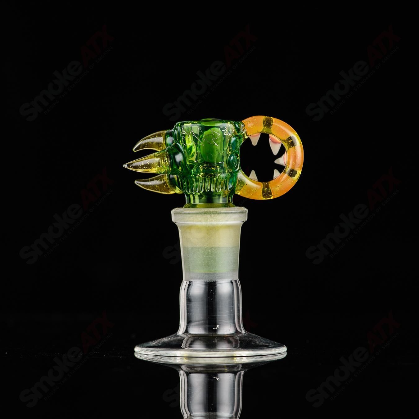 Salt Glass UV reactive 19mm 3-hole slide bowl for heady glass rigs, featuring vibrant glow-in-the-dark design and multiple holes.