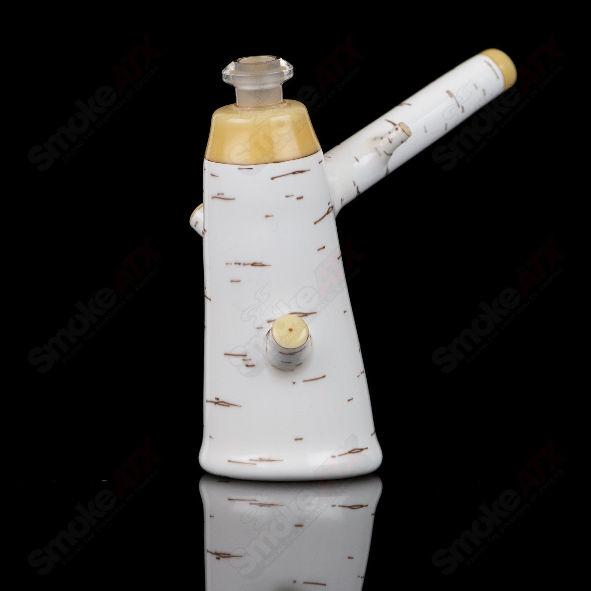 Foster Glass Birch Poker Rig, a heady glass concentrate rig with intricate design and clear glass construction.