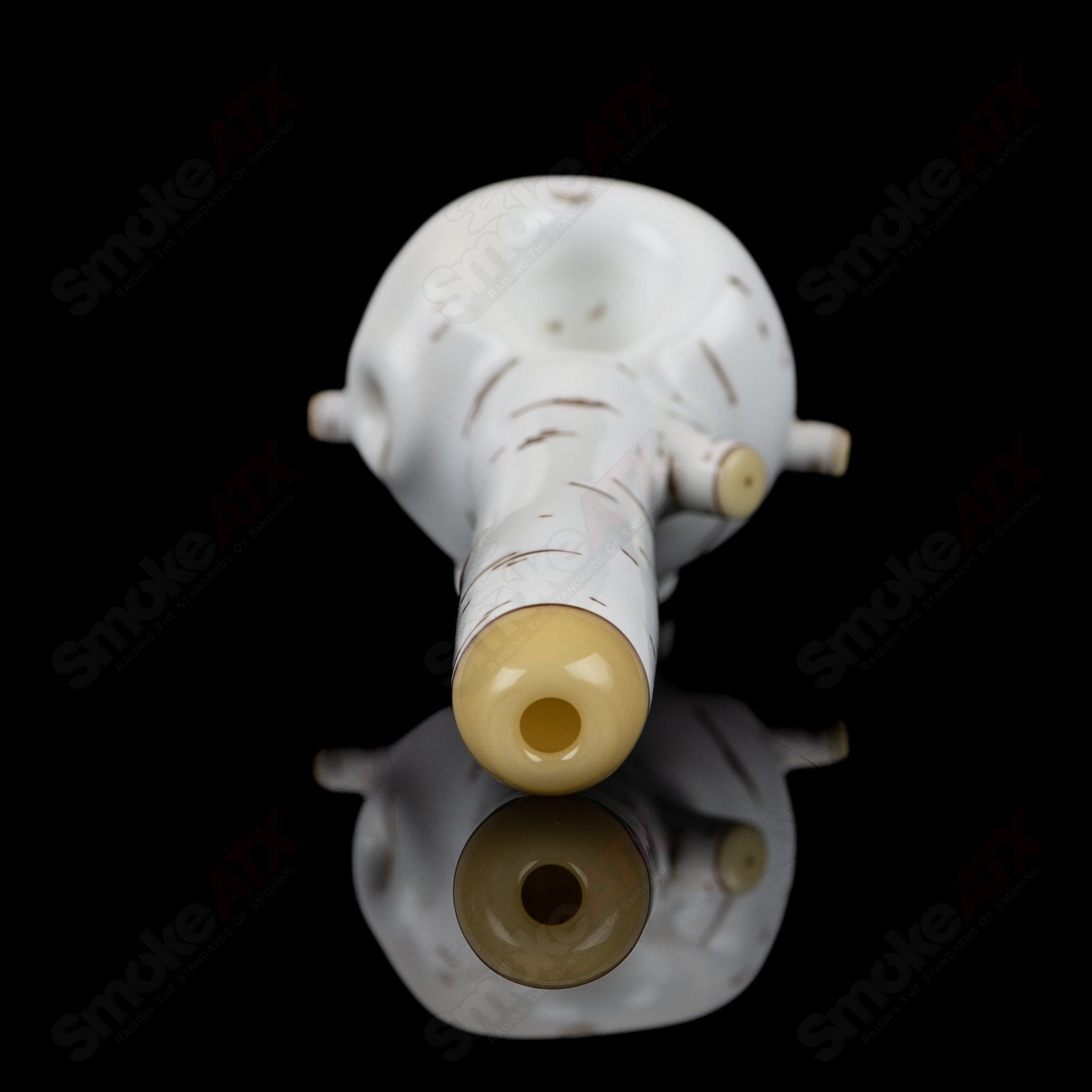 Foster Glass Heady Glass Birch Skull Spoon pipe with detailed thatched bark design and clear glass accents.