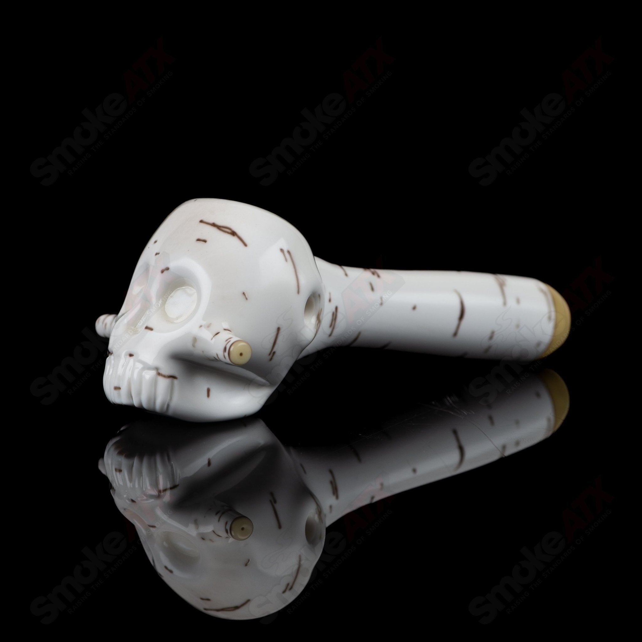 Foster Glass Heady Glass Birch Skull Spoon Pipe featuring a detailed birch skull design and smooth glass construction.